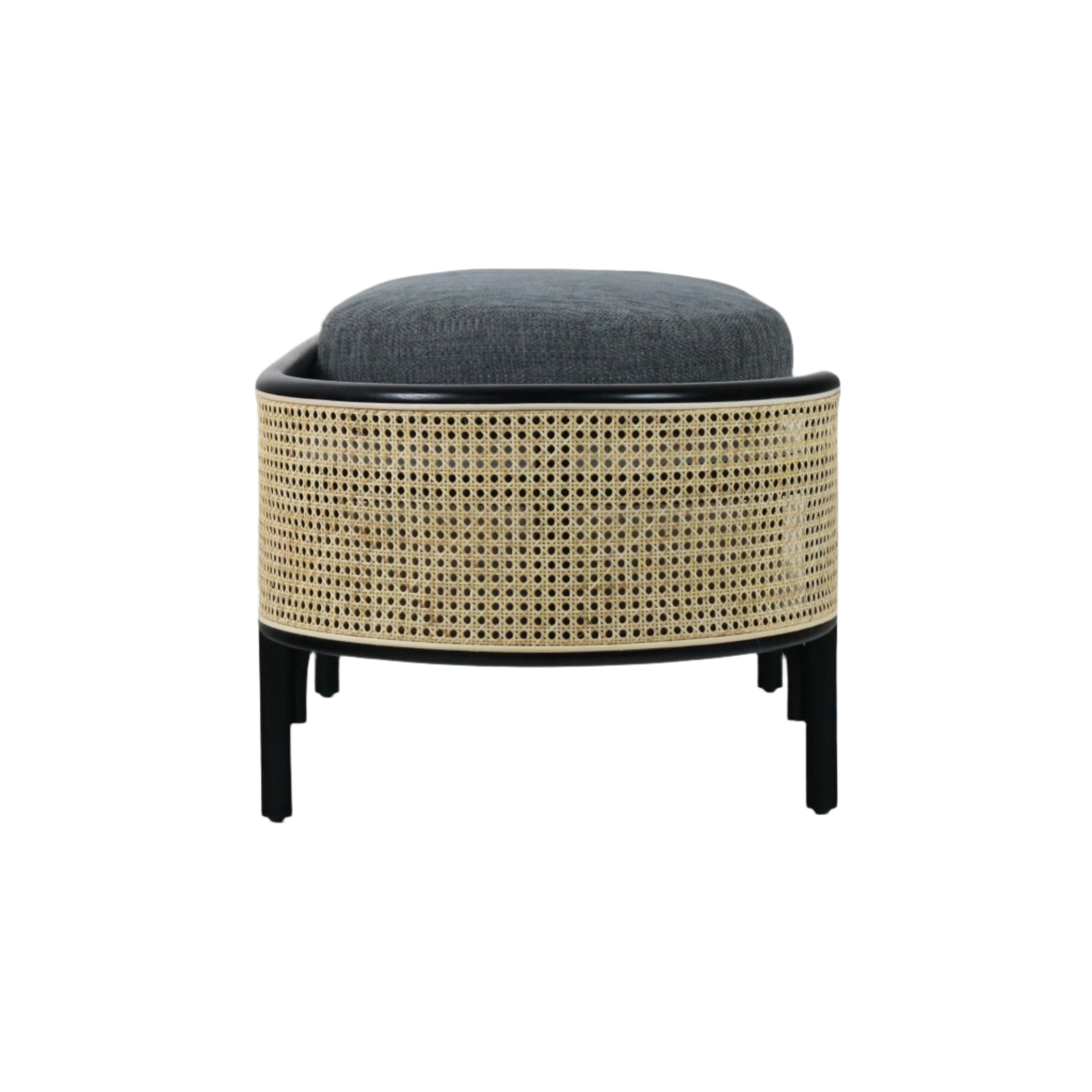 Front view of a solid wood bench with natural rattan cane sides, black wood frame and legs, and a dark gray upholstered cushion, styled with a modern boho look suitable for bedroom or entryway seating.