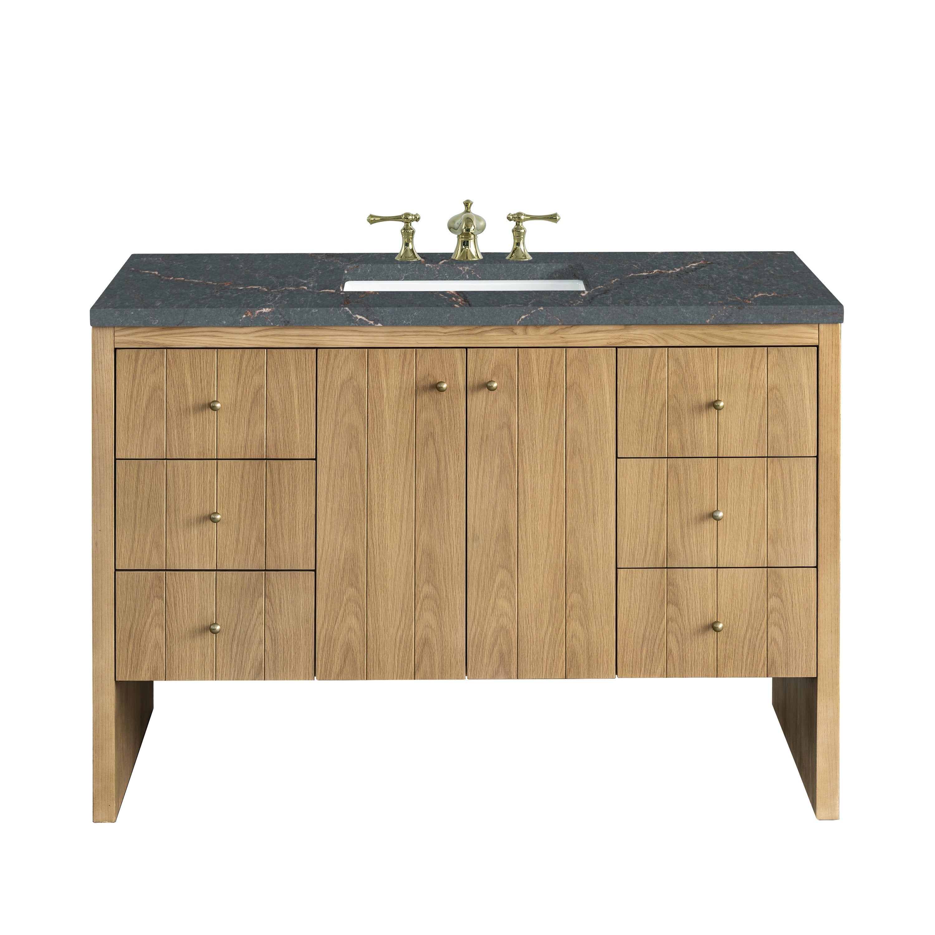 48-inch modern single-sink bathroom vanity in light natural oak with vertical plank doors, dark stone quartz top, rectangular white undermount sink and brass widespread faucet; three drawers per side and central double-door storage.