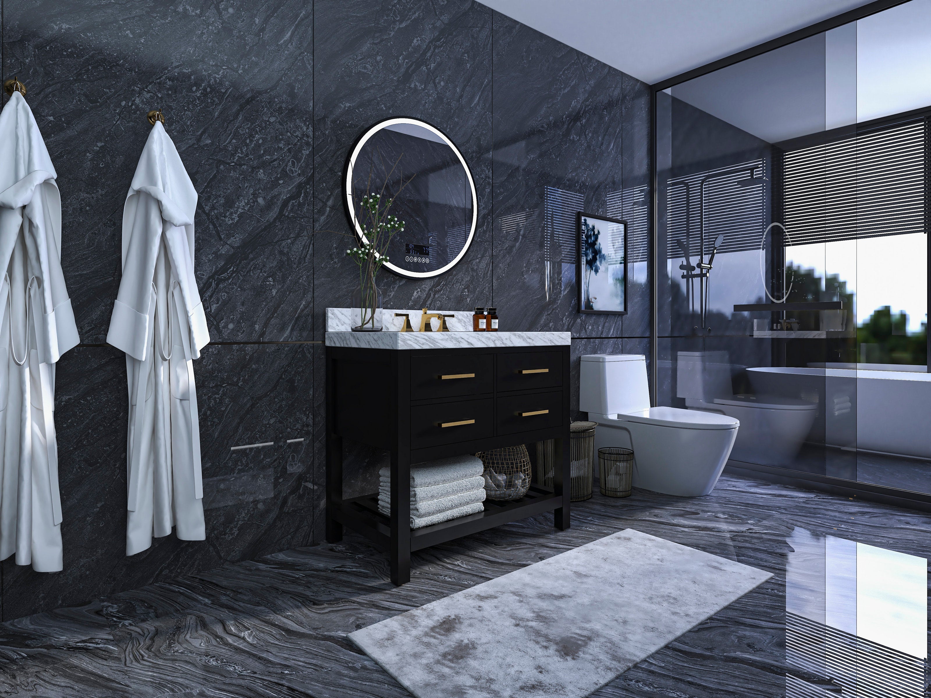 Freestanding black solid wood 36-inch single-sink vanity with a stone marble top, brass faucet and drawer pulls, round illuminated mirror above and folded towels on the lower shelf in a modern stone-walled bathroom.