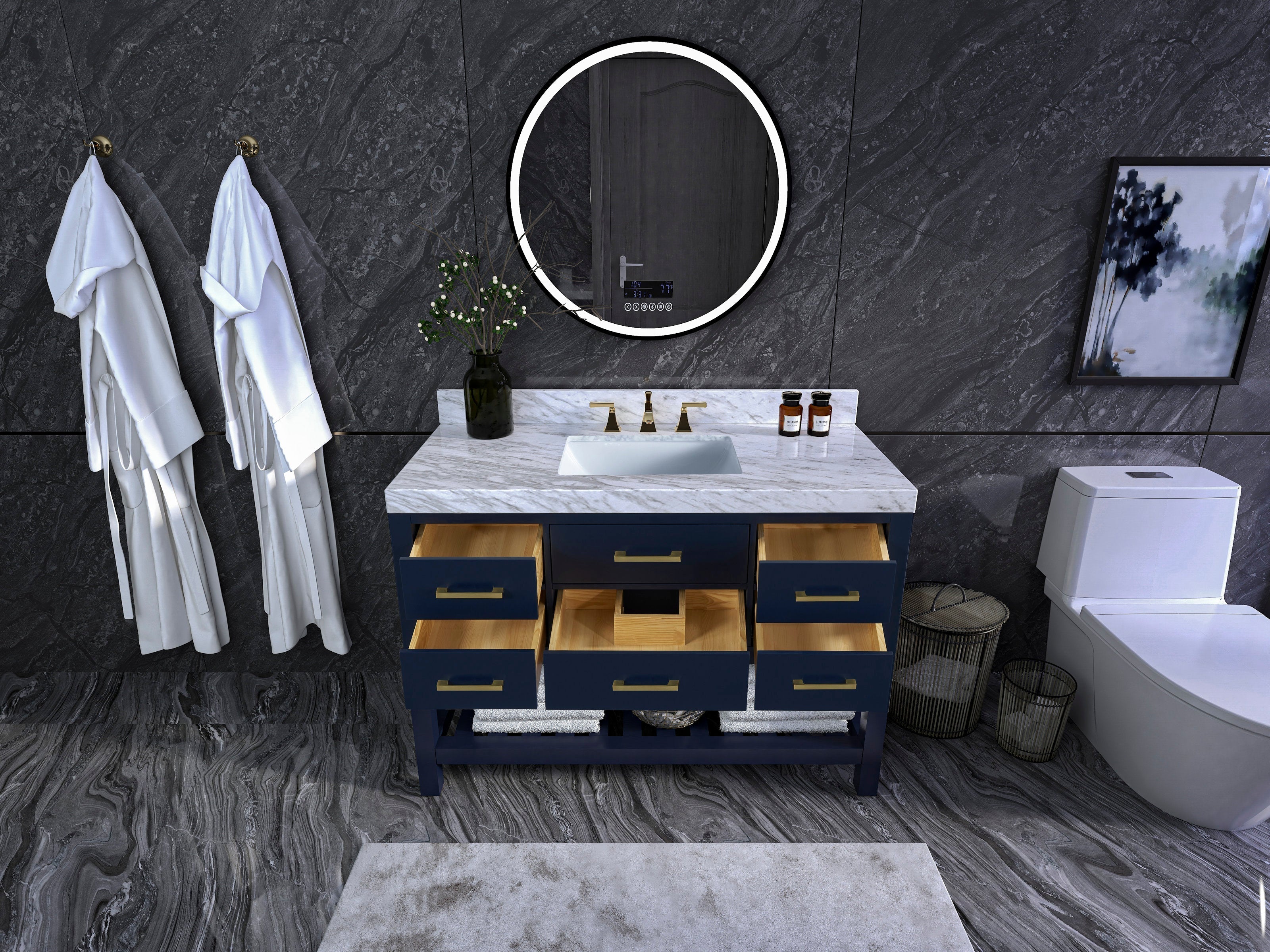48-inch solid wood vanity with white marble top and undermount ceramic sink, brass faucets and navy-blue painted case with open natural-wood drawers, round LED mirror and dark stone wall backdrop.