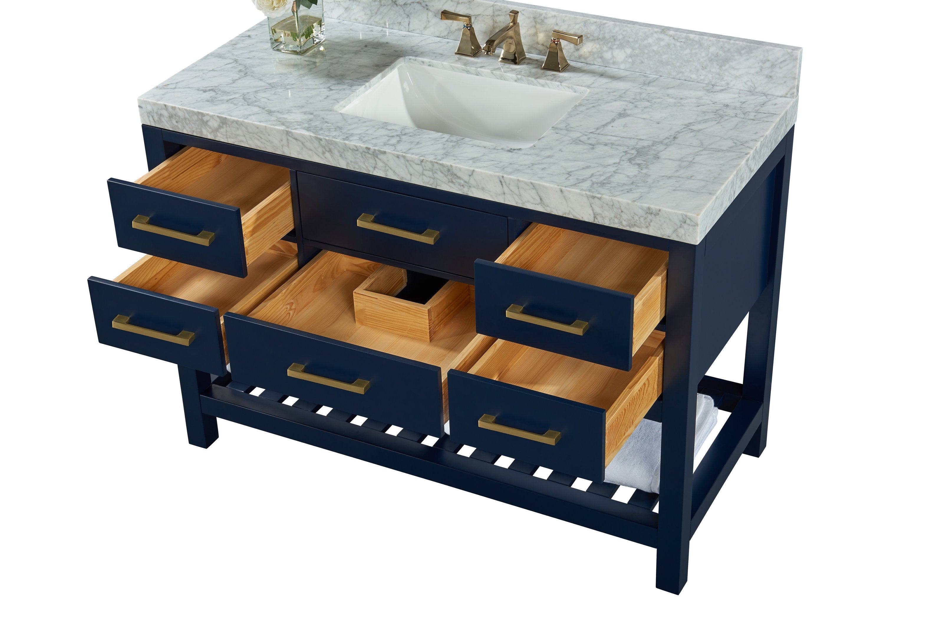 Contemporary solid wood bathroom vanity with a stone marble top and integrated white ceramic undermount sink, brushed brass faucet and drawer pulls, six drawers with natural wood interiors and a slatted open shelf.