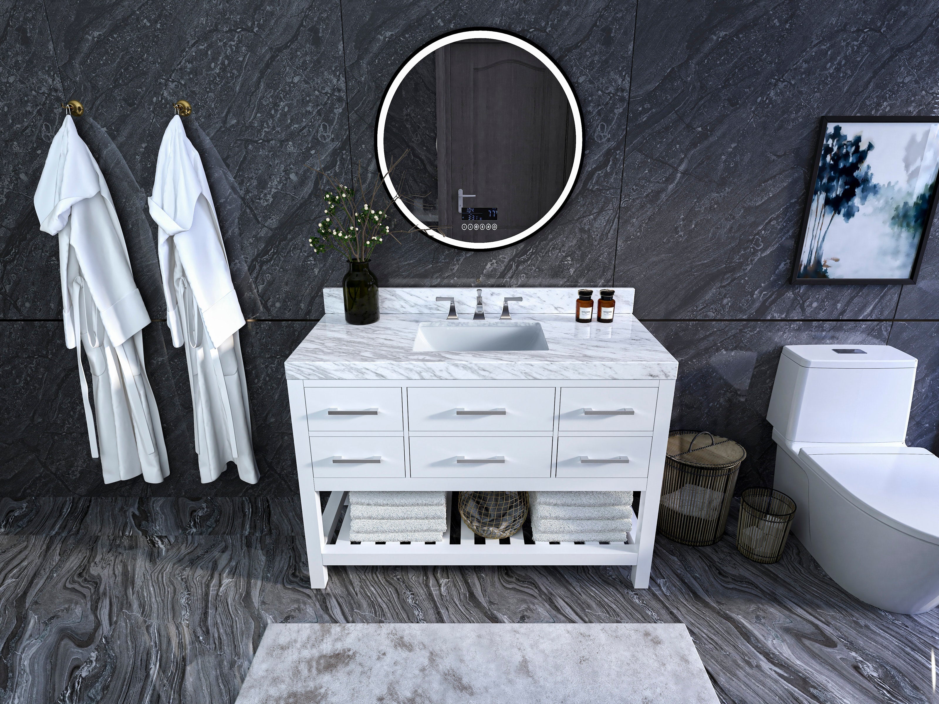 Freestanding white solid-wood single-sink vanity with a marble top and rectangular undermount sink, brushed metal drawer pulls and open towel shelf; round illuminated mirror on a dark stone wall with robes and a toilet nearby.
