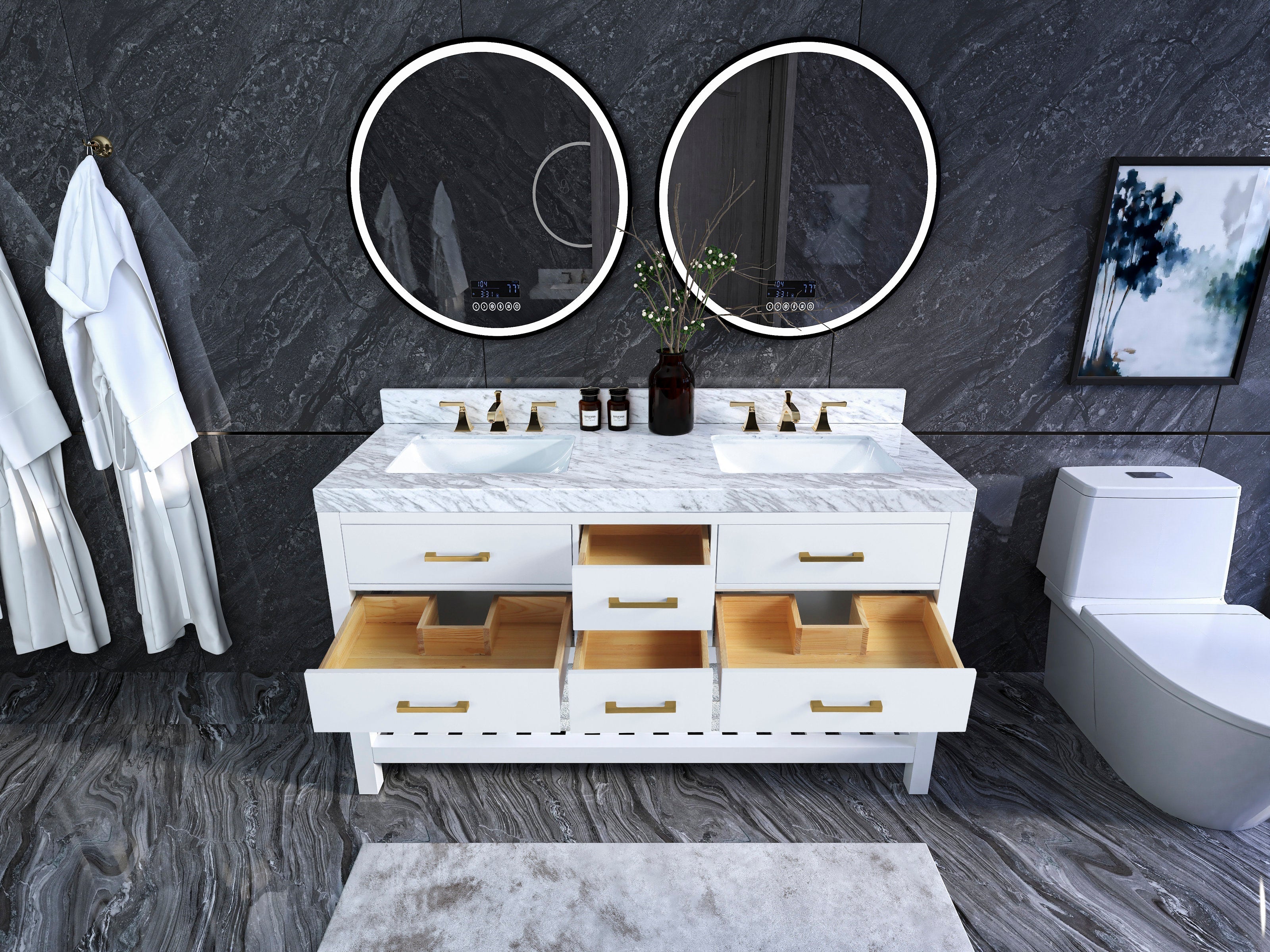 White solid wood 60-inch double-sink vanity with stone top and two ceramic sinks, brass faucets and handles, open drawers showing wooden interiors, round illuminated mirrors on a dark stone wall with vase and toilet nearby.