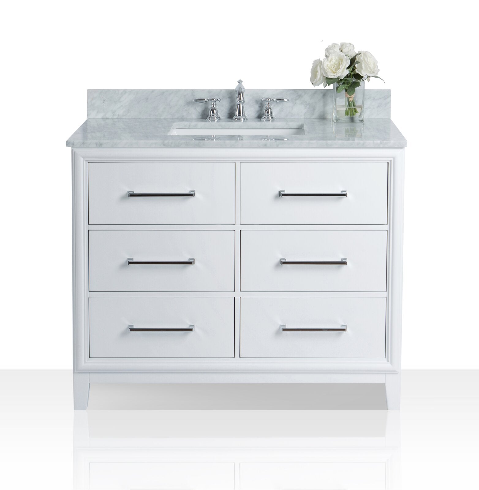White 42-inch modern solid-wood bathroom vanity with six drawers and chrome bar pulls; stone top and backsplash with undermount ceramic sink and chrome faucet, vase of white roses on the right.