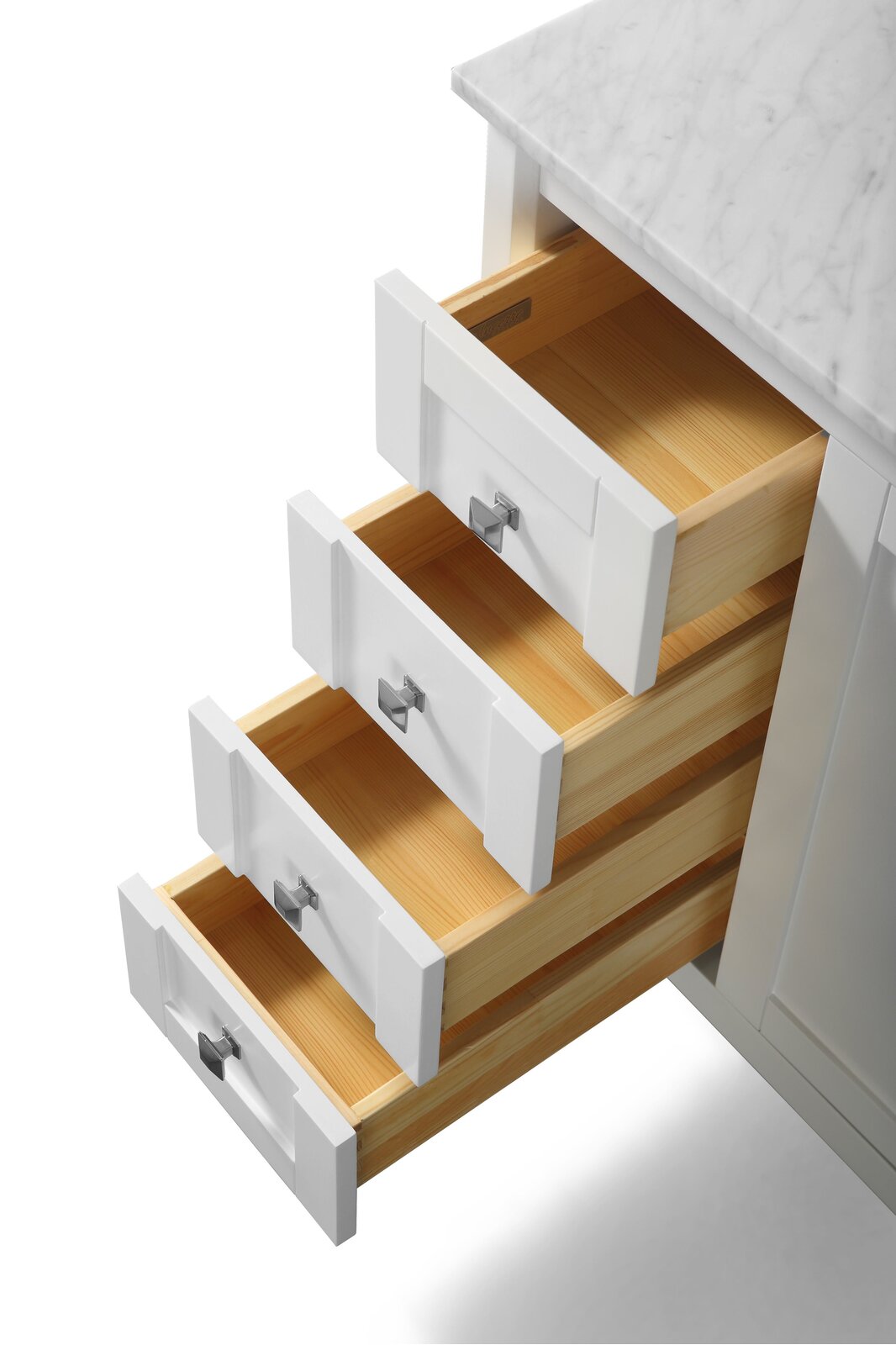 Close-up of a bathroom vanity showing four open drawers with white shaker-style fronts and square chrome pulls, natural solid wood interiors, and a stone marble countertop corner.