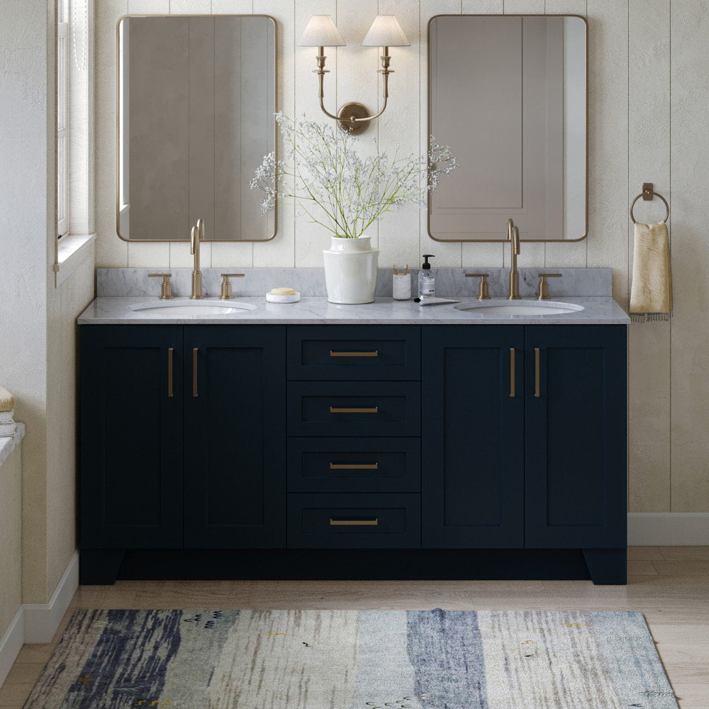 73-inch solid wood double-sink bathroom vanity in deep navy with a light stone countertop, satin bronze faucets and hardware, undermount white sinks, central drawers and two mirrors.