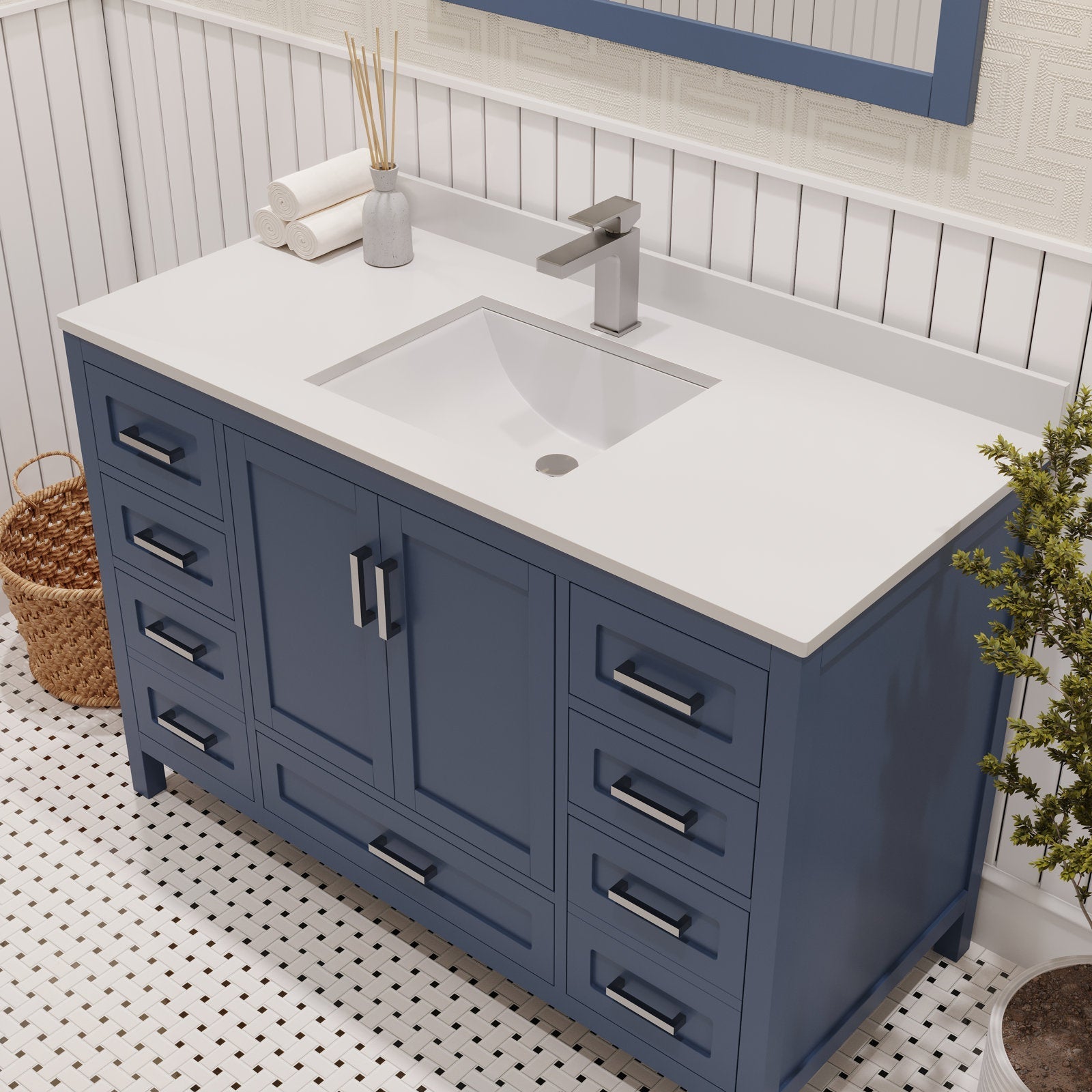 48-inch solid wood single-sink vanity in blue with a white stone top, ceramic undermount basin, brushed-metal handles and a rectangular faucet in a modern-contemporary bathroom.