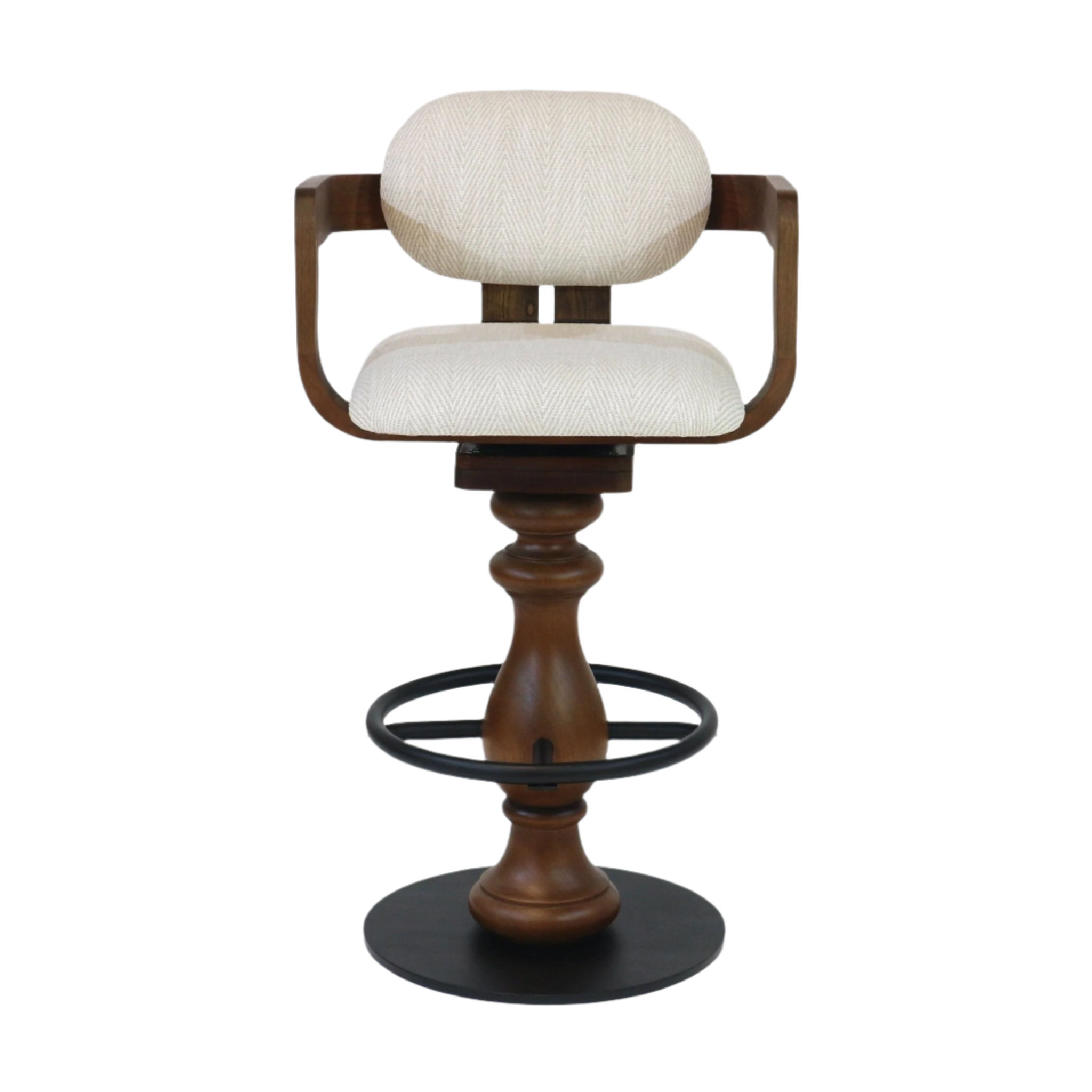 Beige upholstered bar stool with a rounded back and curved wooden armrests, turned natural wood pedestal, and black metal foot ring with a round base; counter-height swivel seat in a modern style.