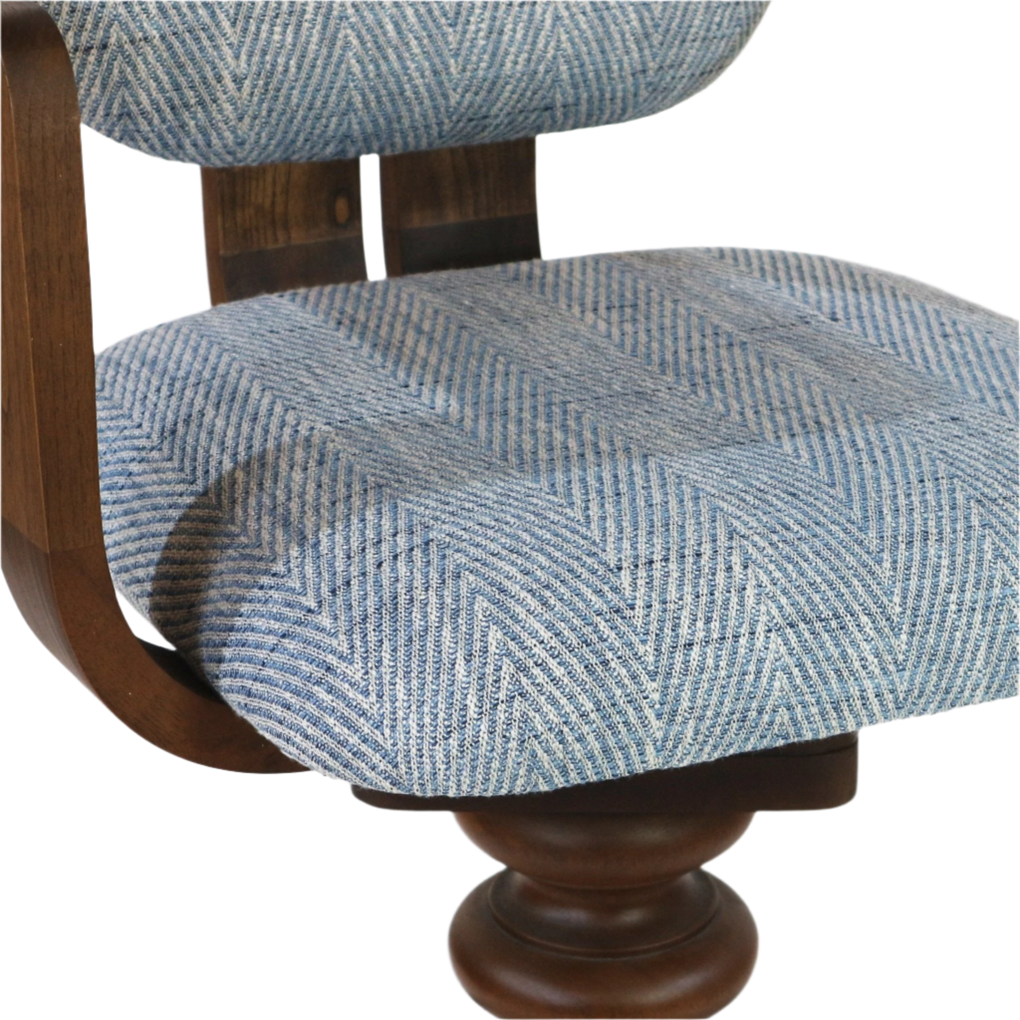 Close-up of a blue herringbone fabric-upholstered bar stool seat and lower back, showing the curved dark-wood frame and turned wooden swivel base.