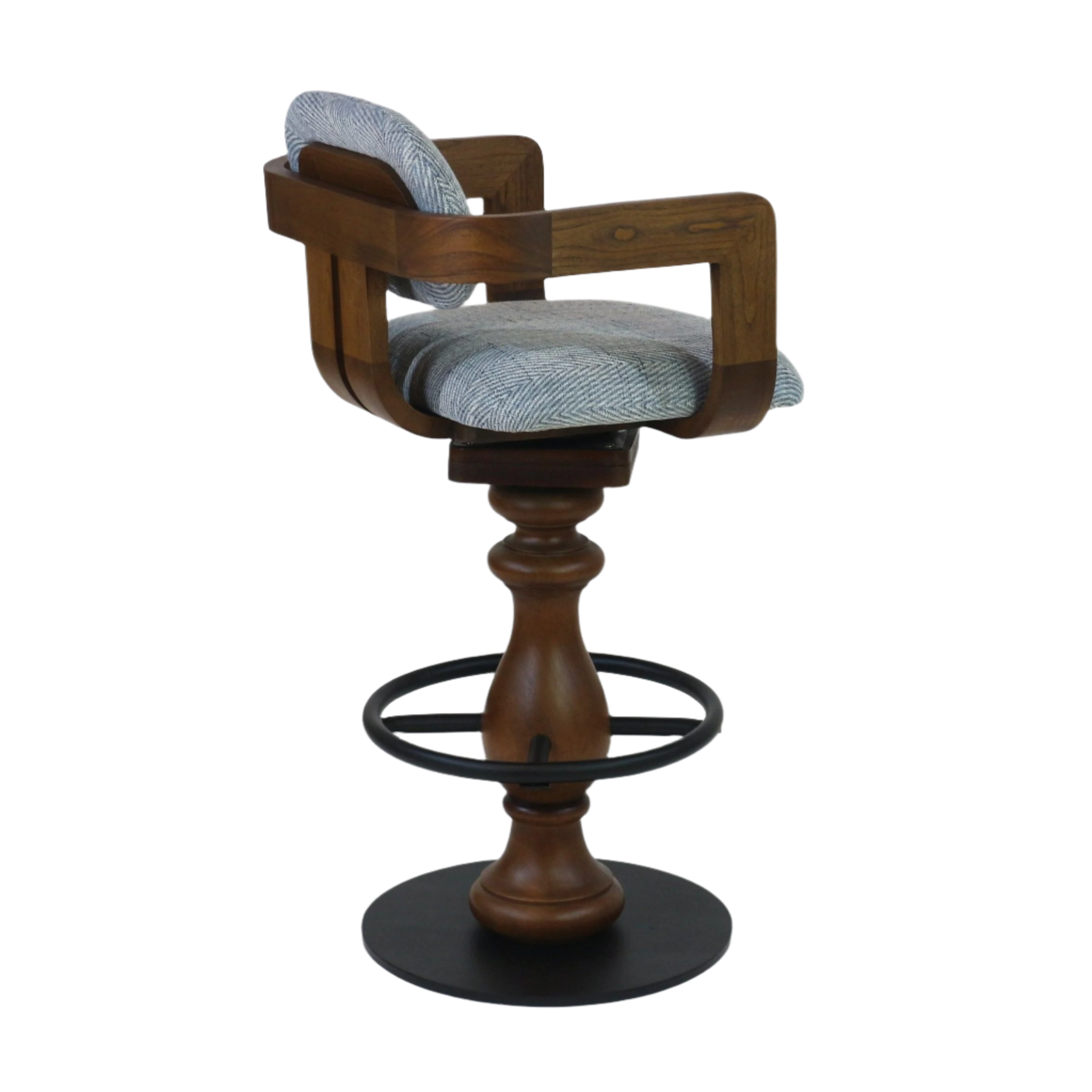 Swivel counter-height bar stool with light gray herringbone fabric seat and back, curved natural wood frame and turned wood pedestal, black metal circular footrest and round metal base.