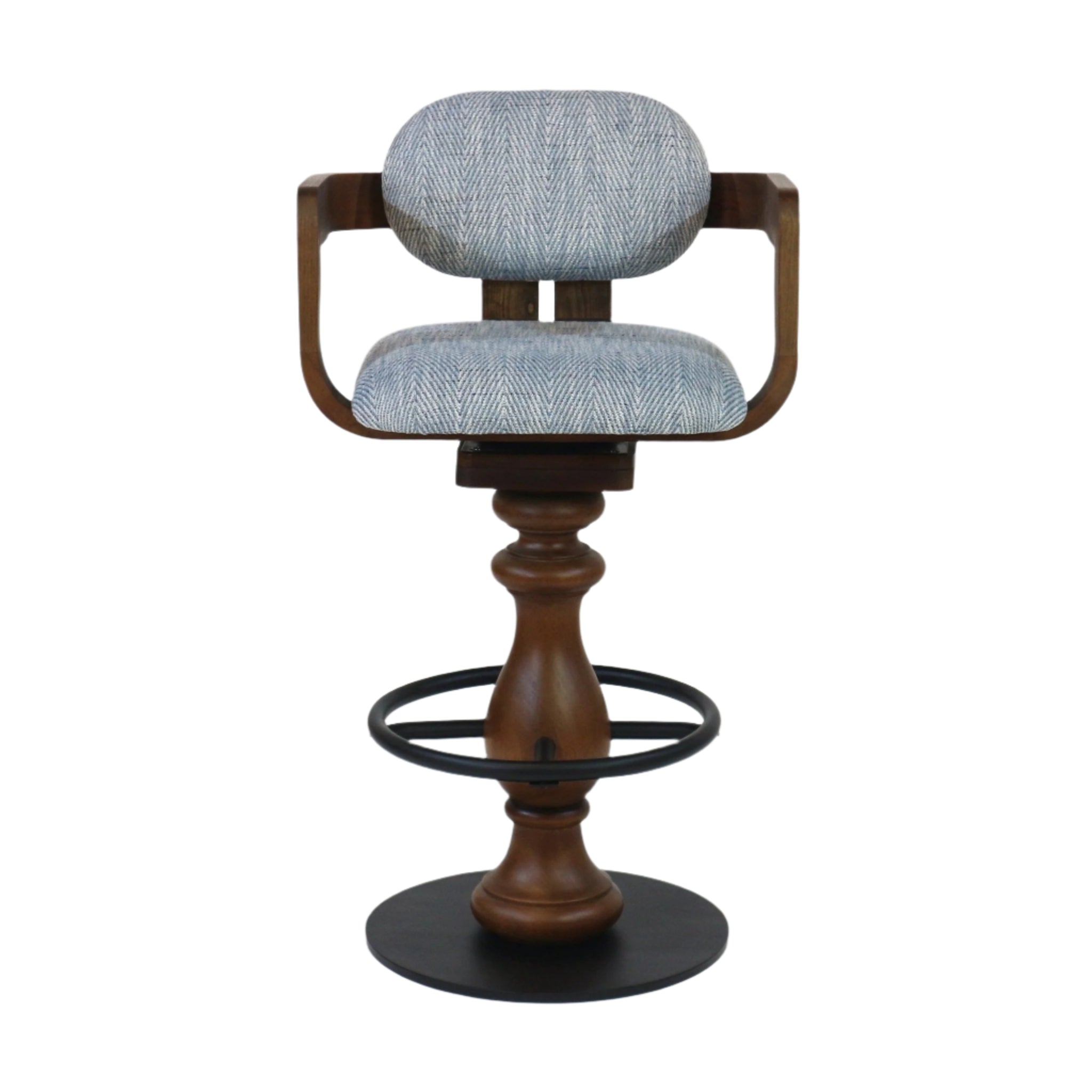 Modern swivel bar stool with light-gray herringbone fabric seat and rounded back, curved natural wood arms and turned wood pedestal base with a black metal footring and round metal floor plate.