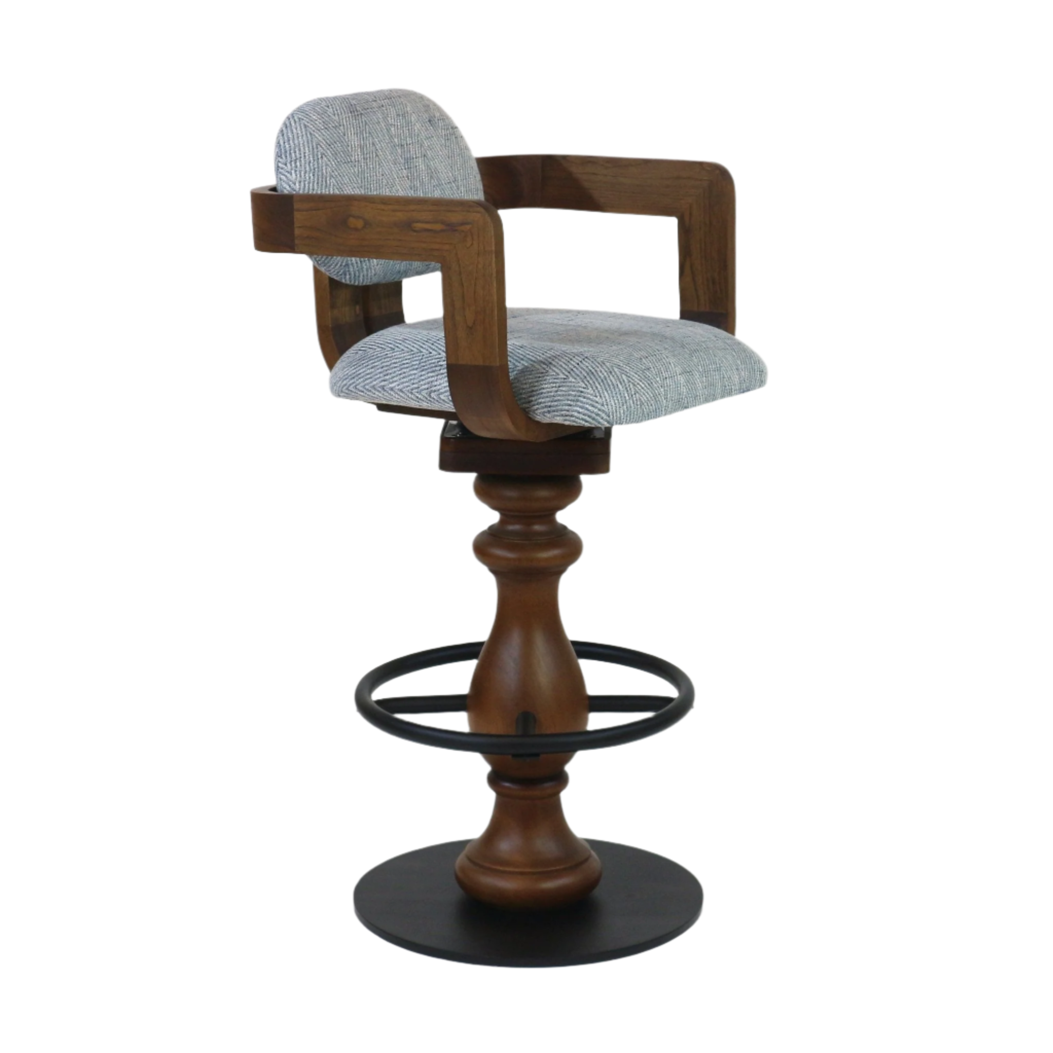 Light-gray upholstered swivel bar stool with curved walnut-finish wooden arms and turned wood pedestal, featuring a black metal footrest ring and round black metal base.