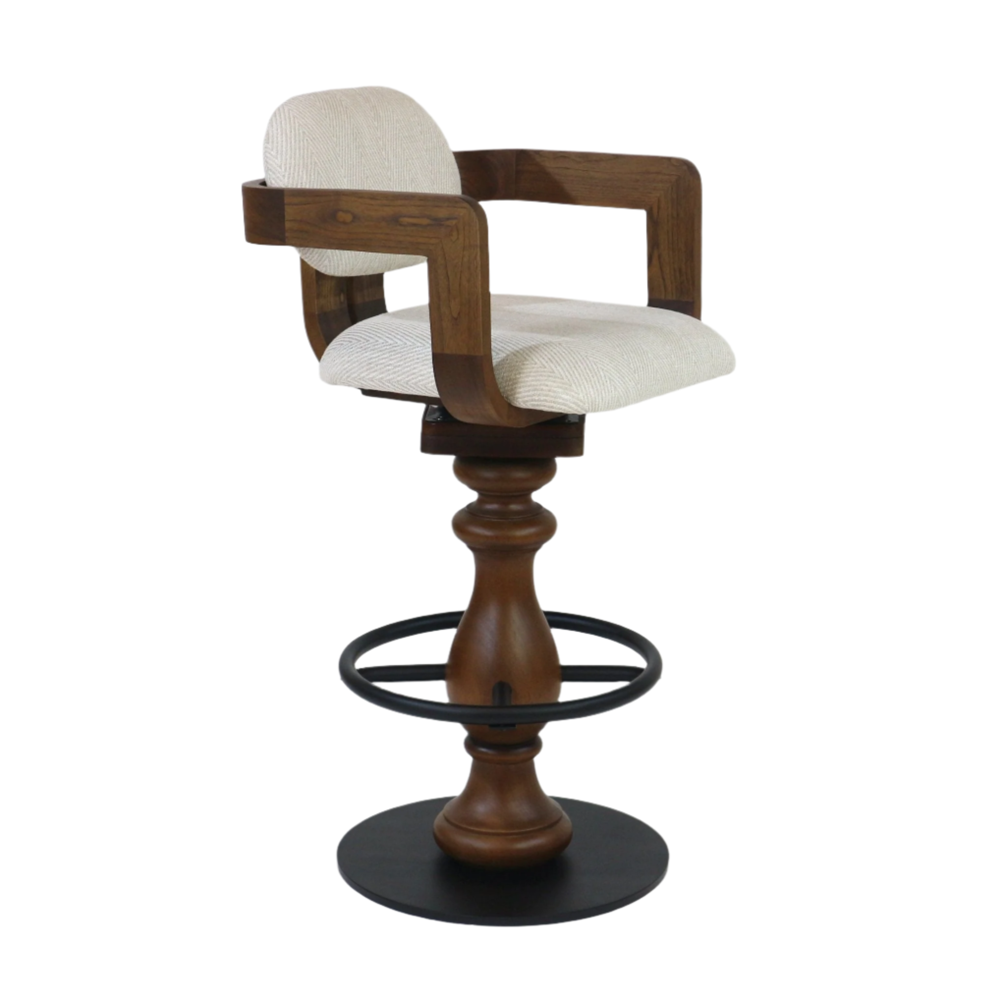 Light beige upholstered swivel bar stool with rounded back and cushioned seat, curved teak-finish wooden arms and turned wood pedestal, black metal circular footrest and round base in a modern counter-height design.