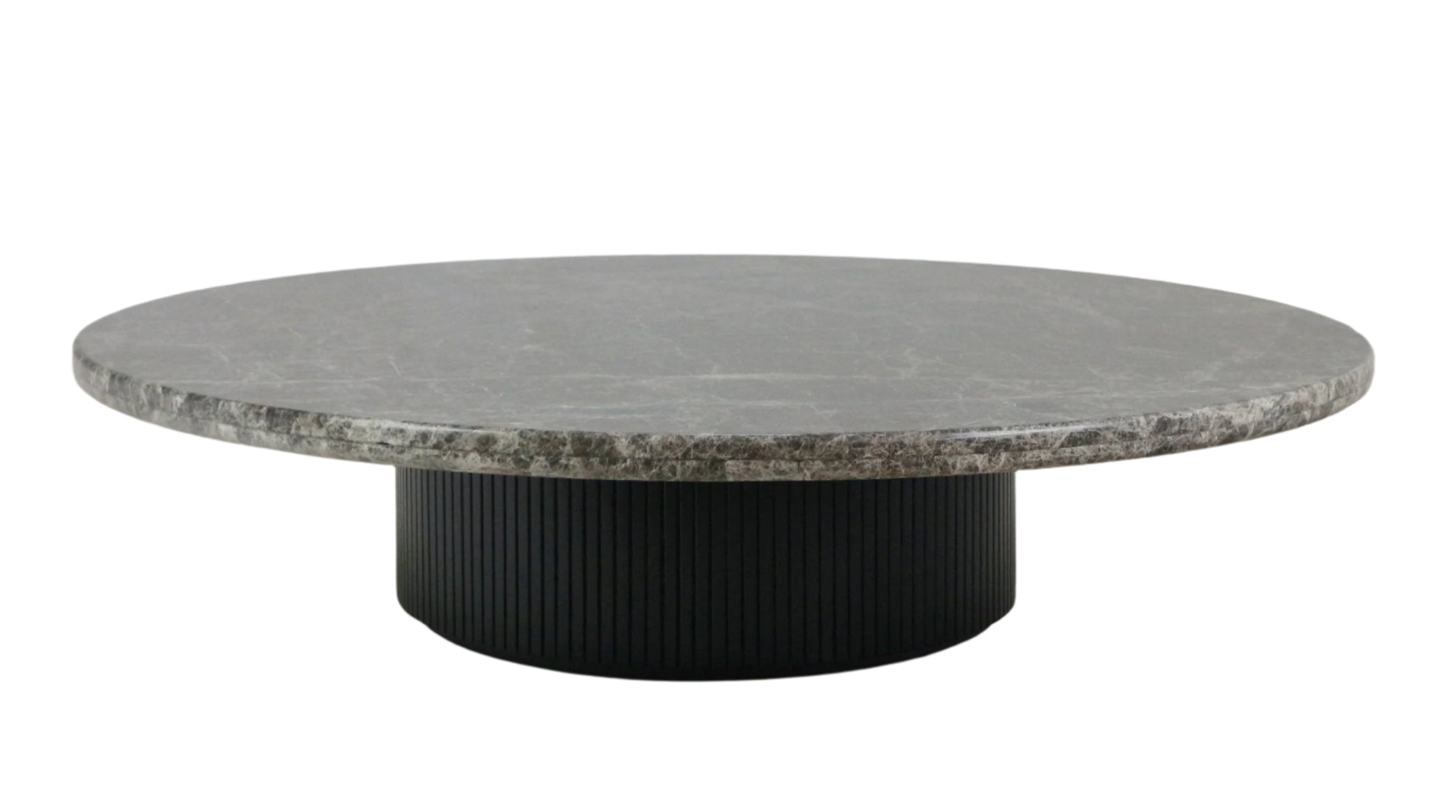 Low-profile round coffee table with a gray veined marble top and a black fluted wooden drum base, photographed on a white background.