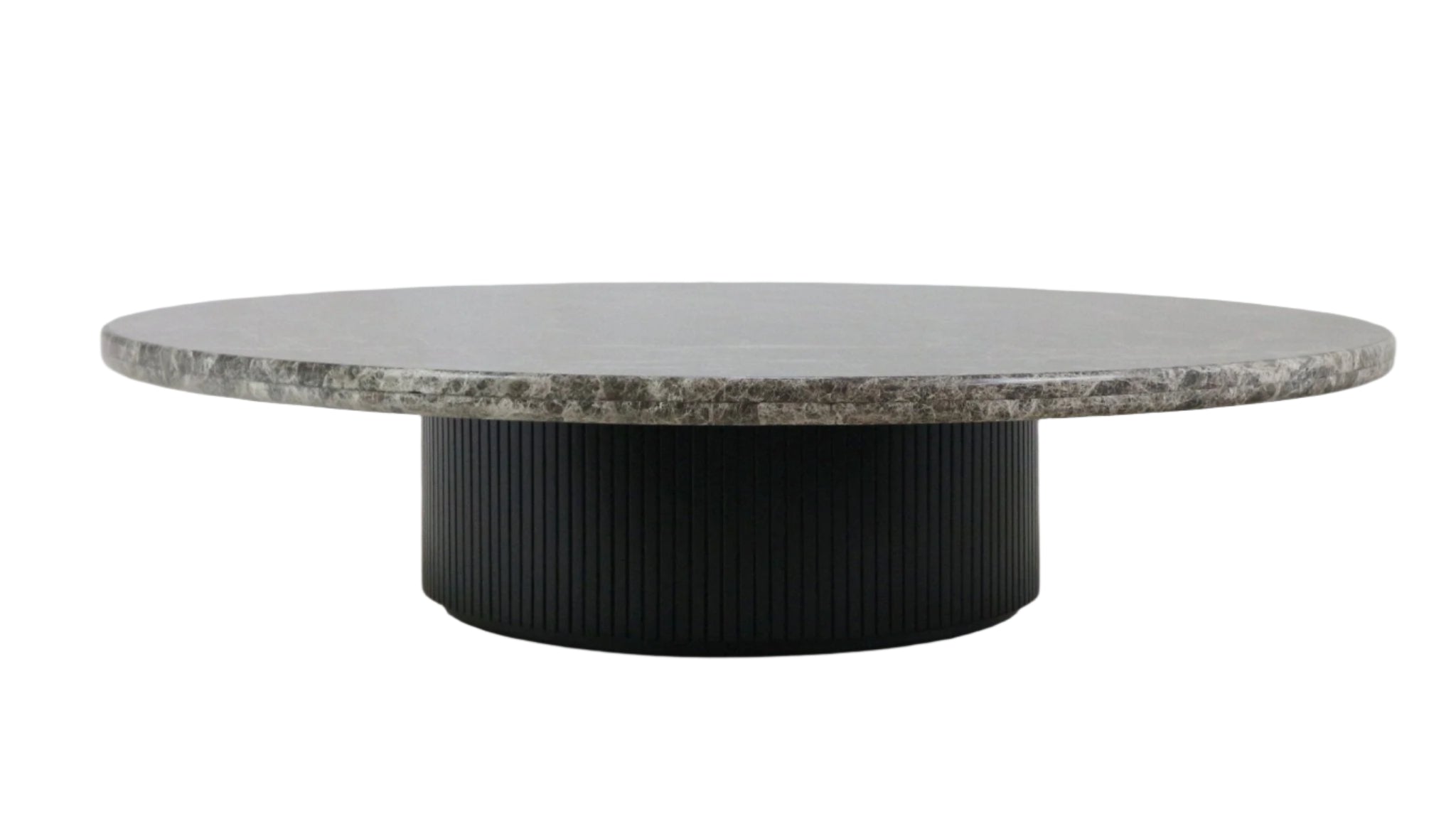 Low round coffee table with a thick gray-brown marble top and a black fluted wooden cylindrical base, showcasing a modern minimalist silhouette for living rooms.