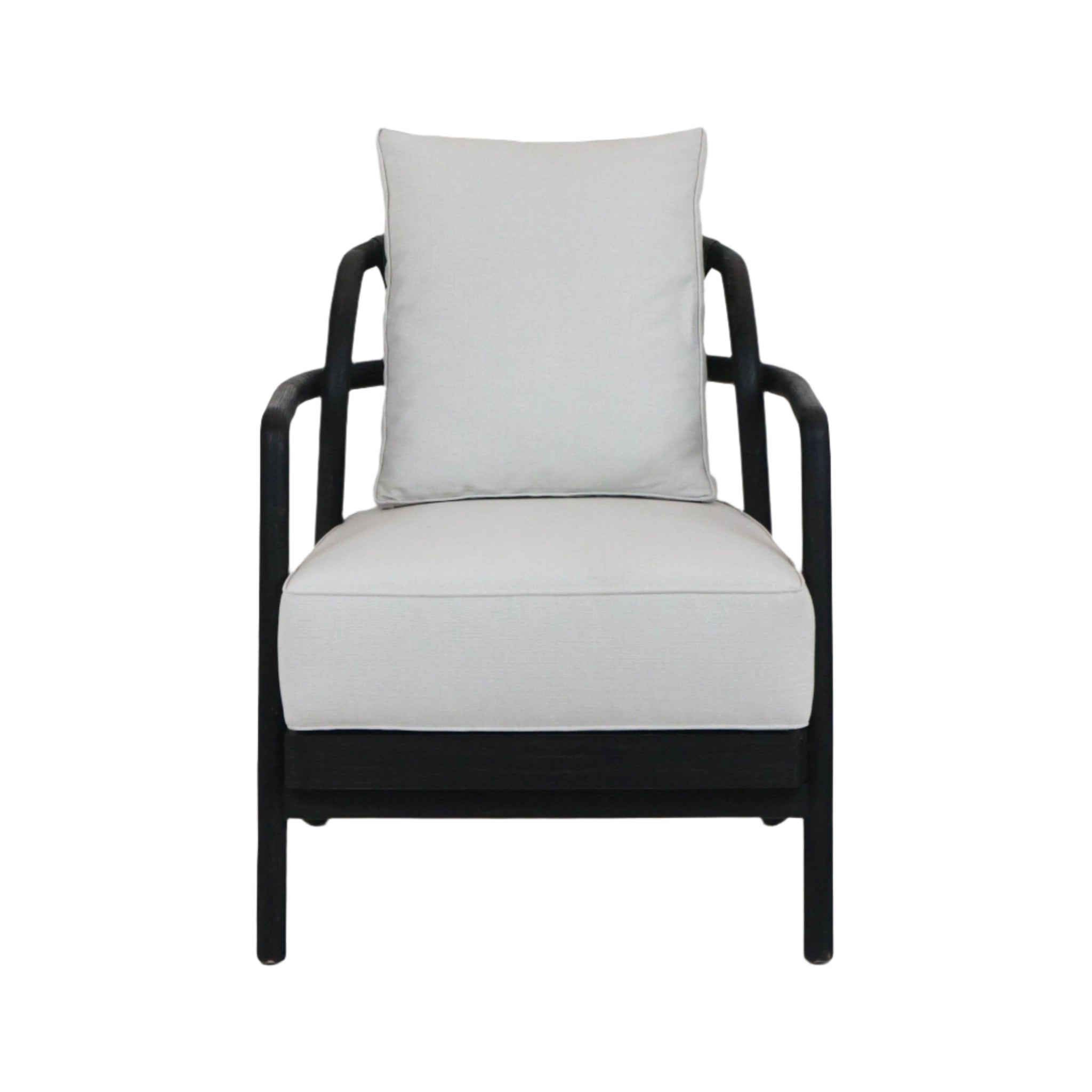 Front view of a mid-century modern armchair with a dark solid teak wood frame and light beige fabric seat and loose back cushion, rounded armrests and low-profile legs.