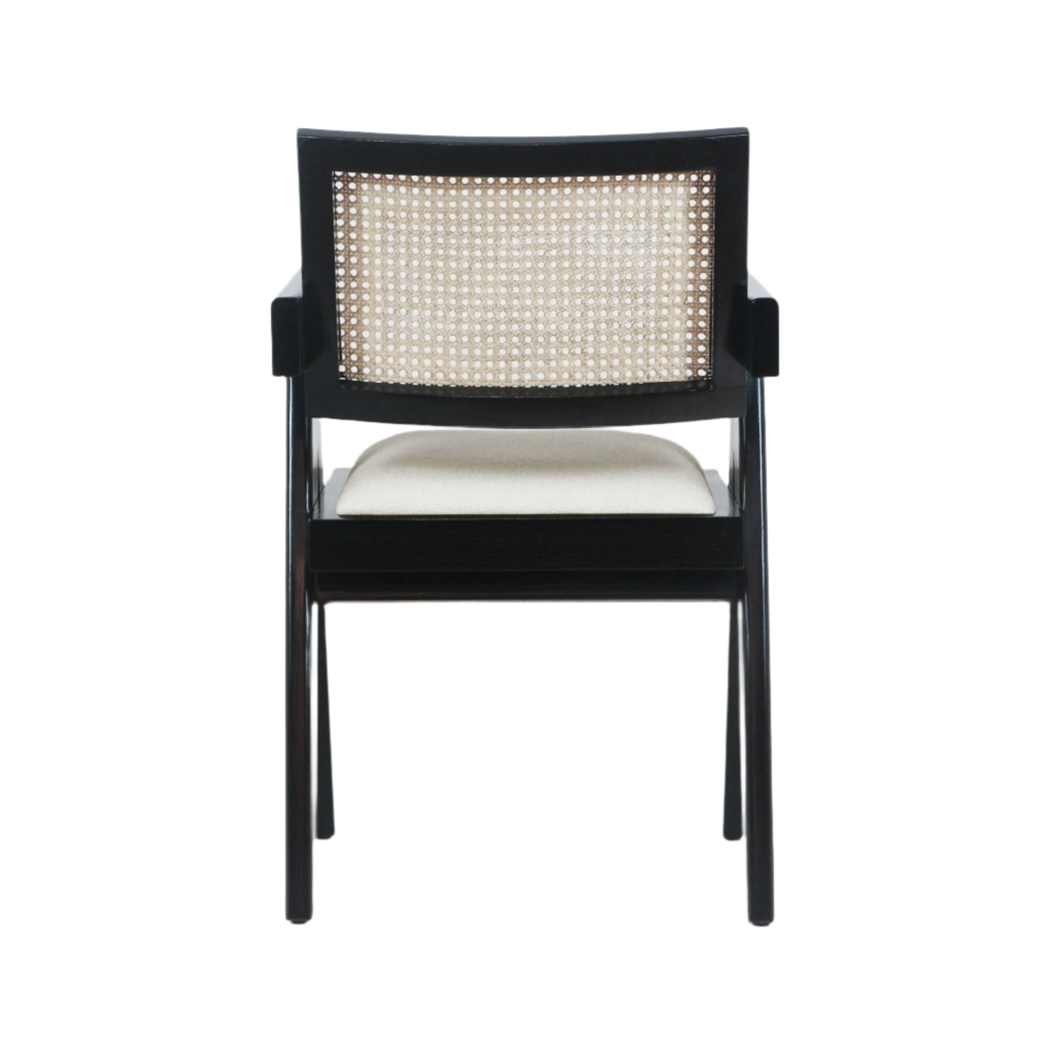 Front view of a black wood dining chair with a woven natural cane back and a beige upholstered seat cushion, mid-century modern silhouette on white background.