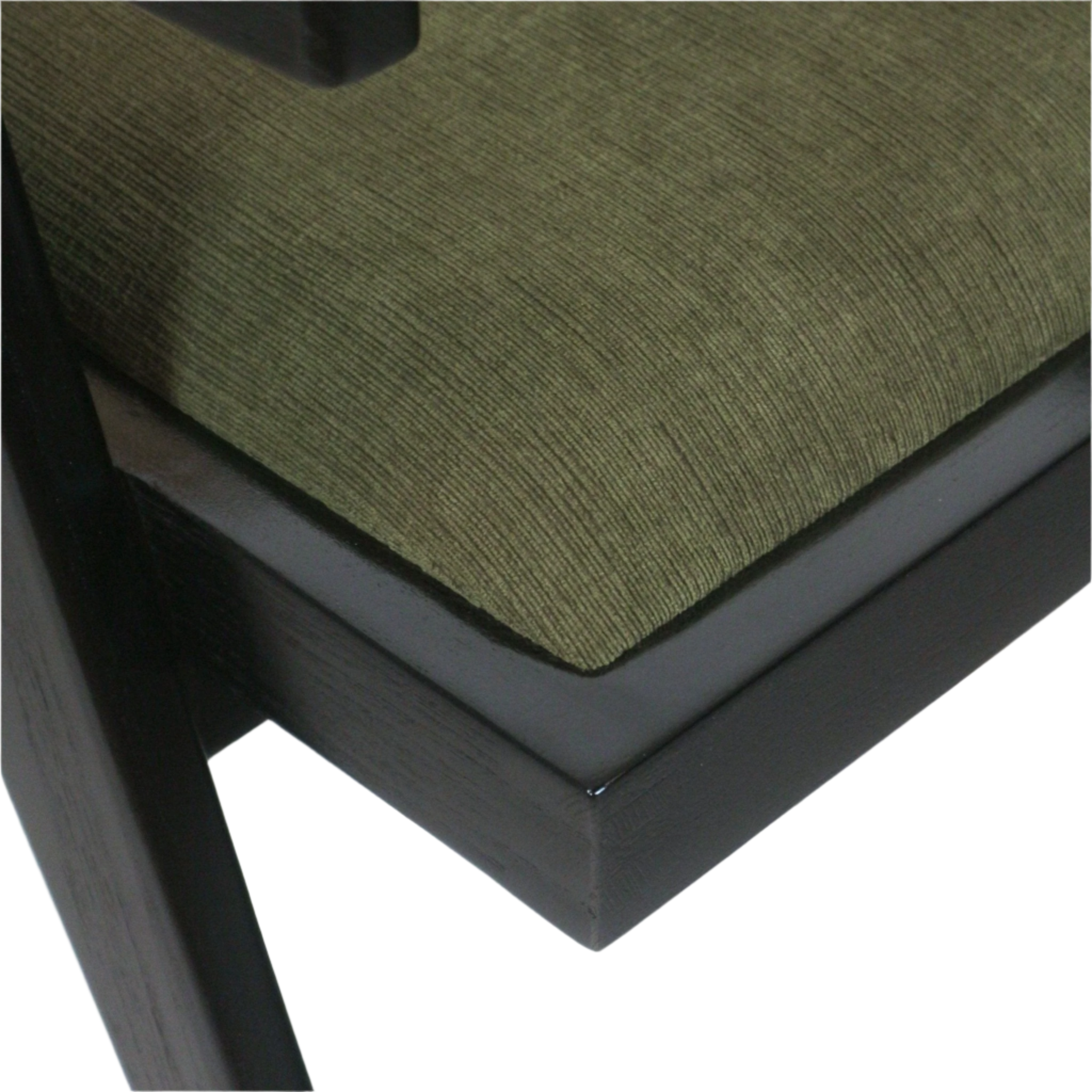 Close-up of an olive-green textured upholstered seat cushion resting on a black stained solid wood chair frame, showing the padded corner and adjacent leg detail.