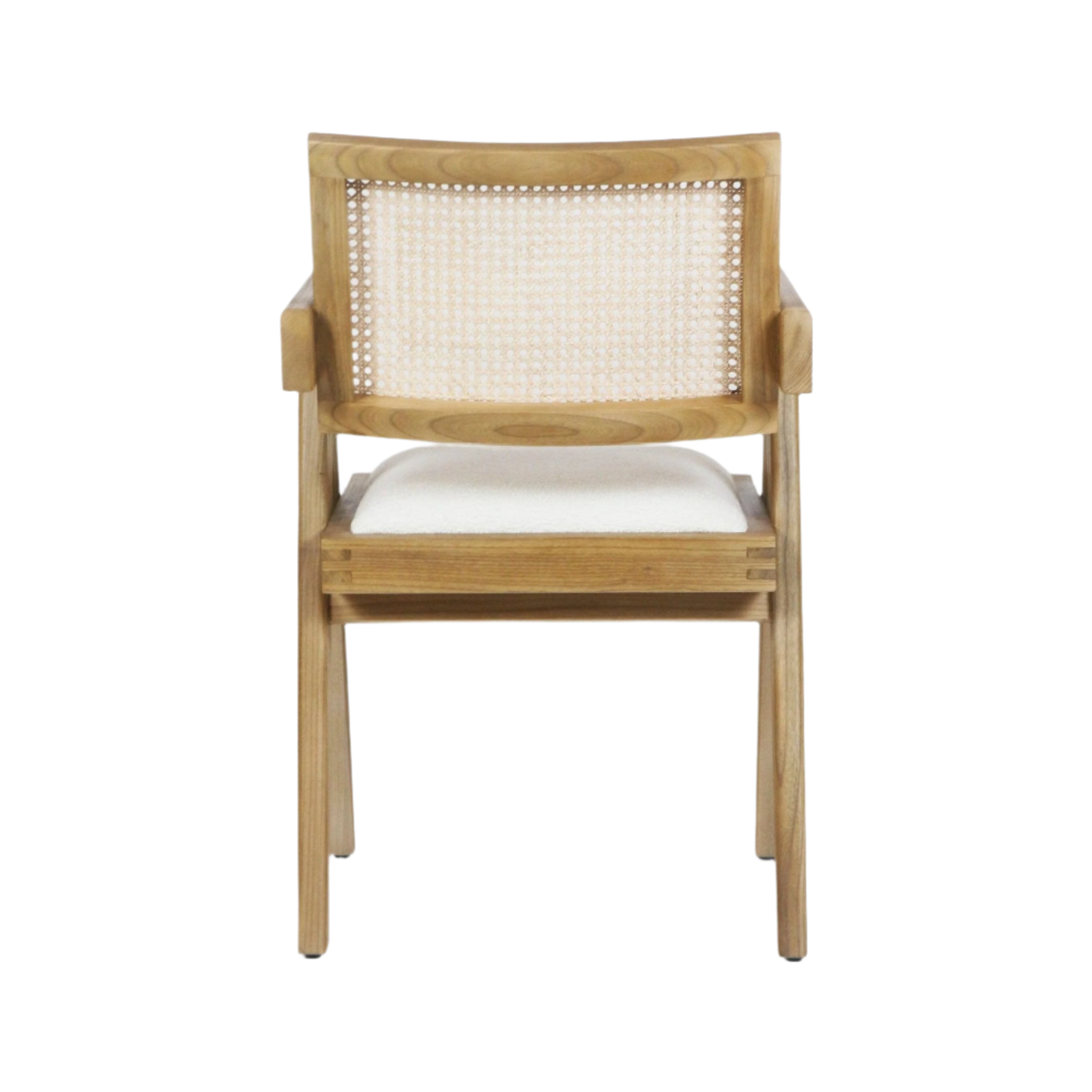 Front view of a mid-century modern dining chair with a natural wood frame, woven cane back, short wooden arms and a cream upholstered seat cushion.