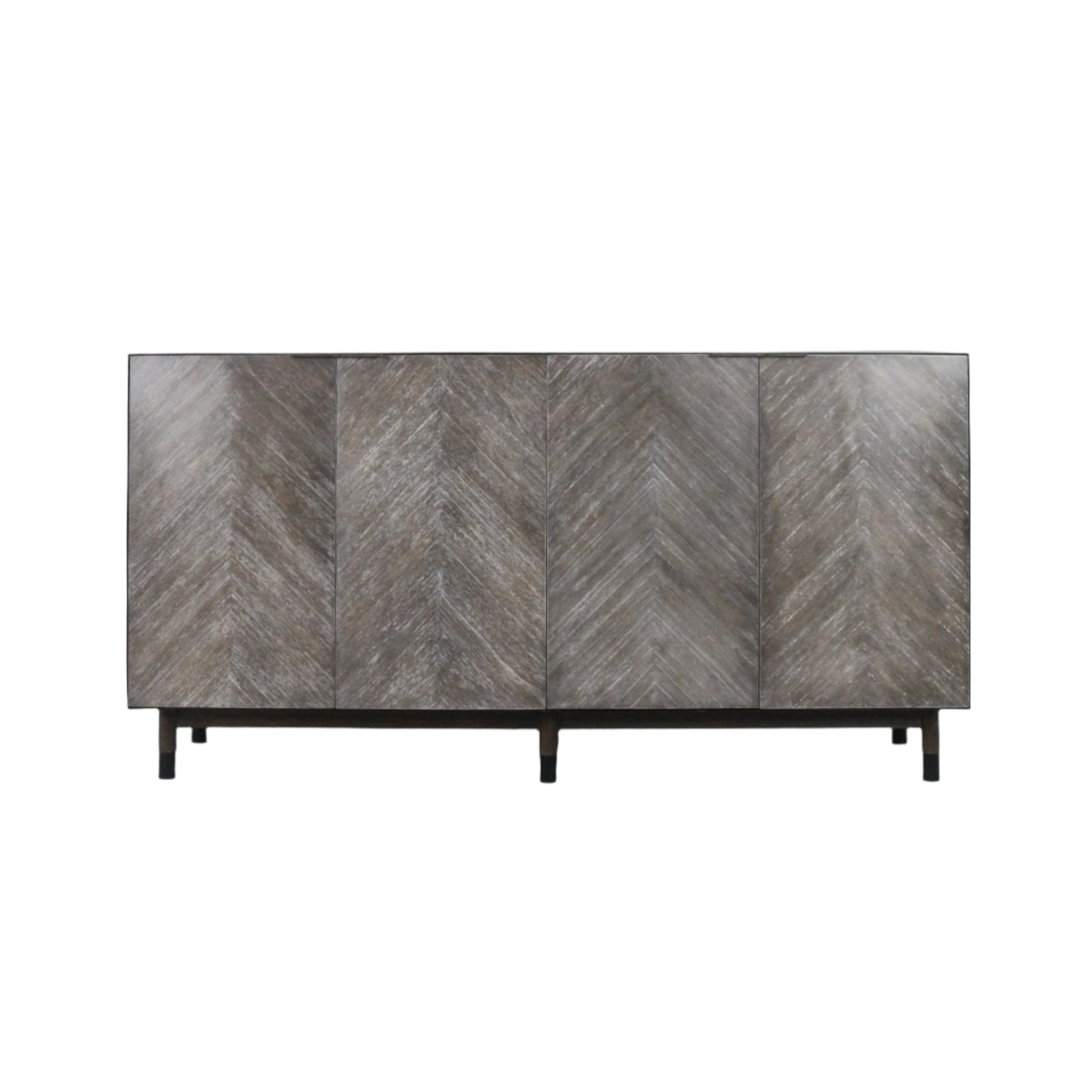 Mid-century modern teak sideboard with grey-washed chevron veneer across four doors, recessed handles and a slim black metal base with tapered legs.