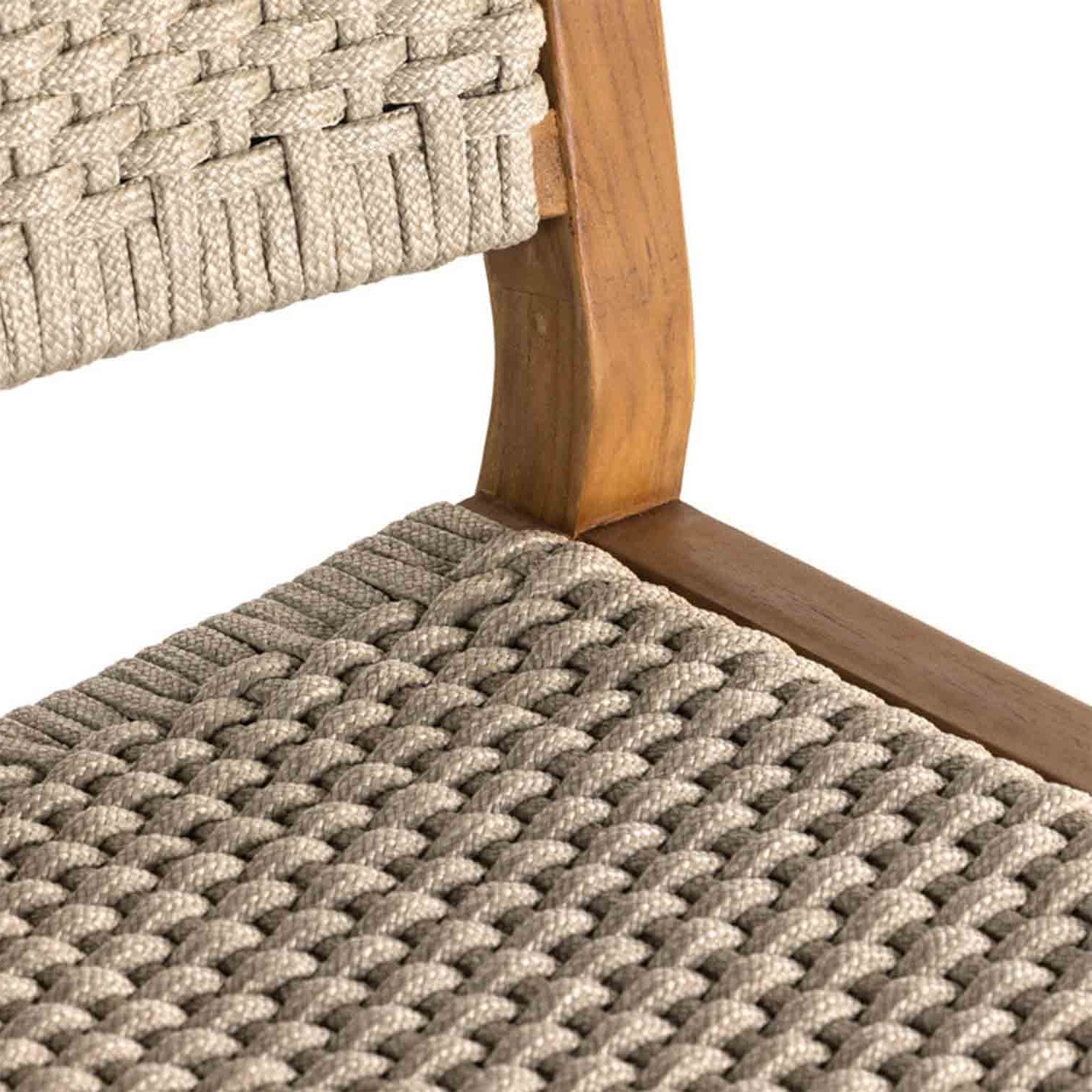 Close-up of an armless outdoor bar stool showing a natural teak wood frame and tightly woven natural beige rope seat and back strap in a coastal style.
