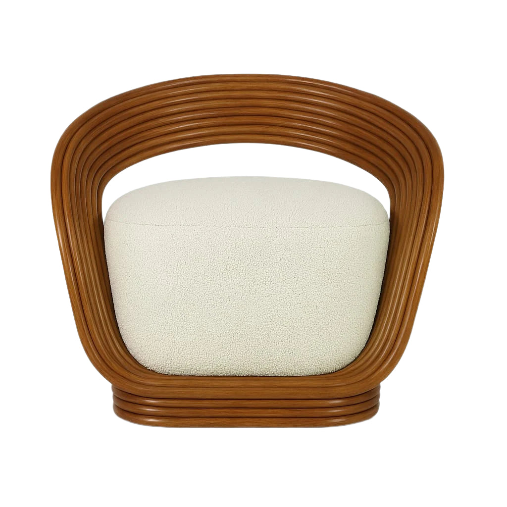 Front view of a modern accent chair featuring a curved natural cane rattan frame and a plush white boucle upholstered seat cushion.
