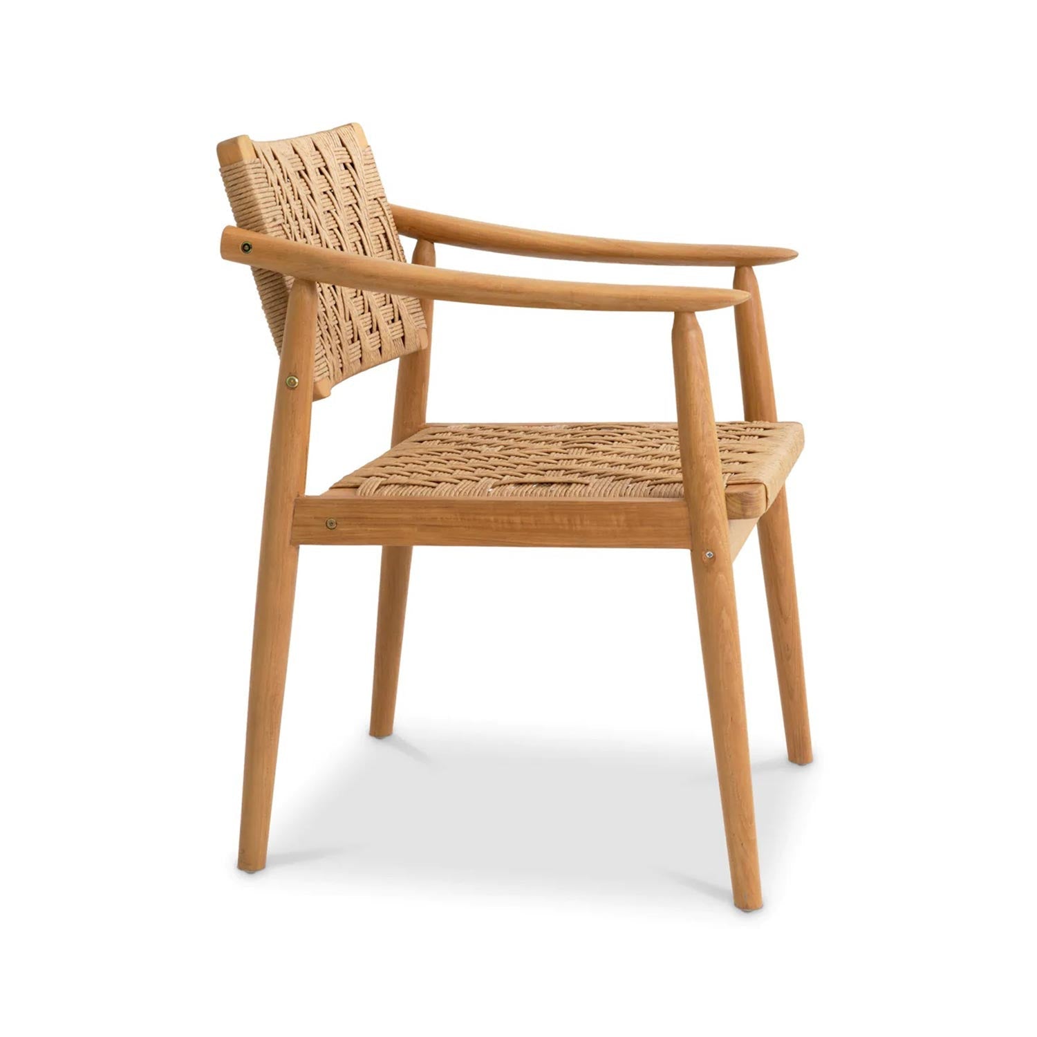 Side view of a natural teak outdoor dining chair with woven rope seat and back, smooth curved armrests, tapered legs and visible brass fasteners in a mid-century modern coastal style.