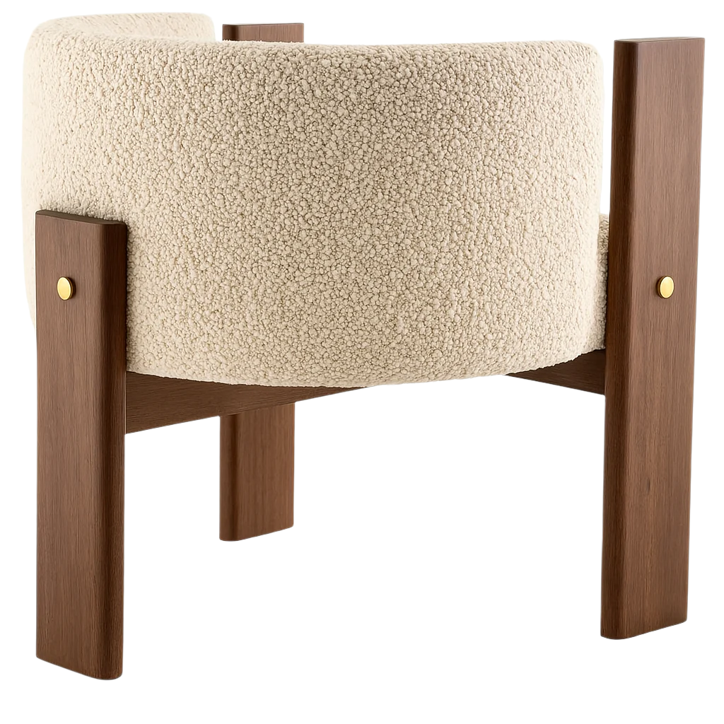 Close-up rear view of an ivory boucle dining chair showing its curved upholstered back, walnut-finished solid wood legs and brass-tone hardware accents.