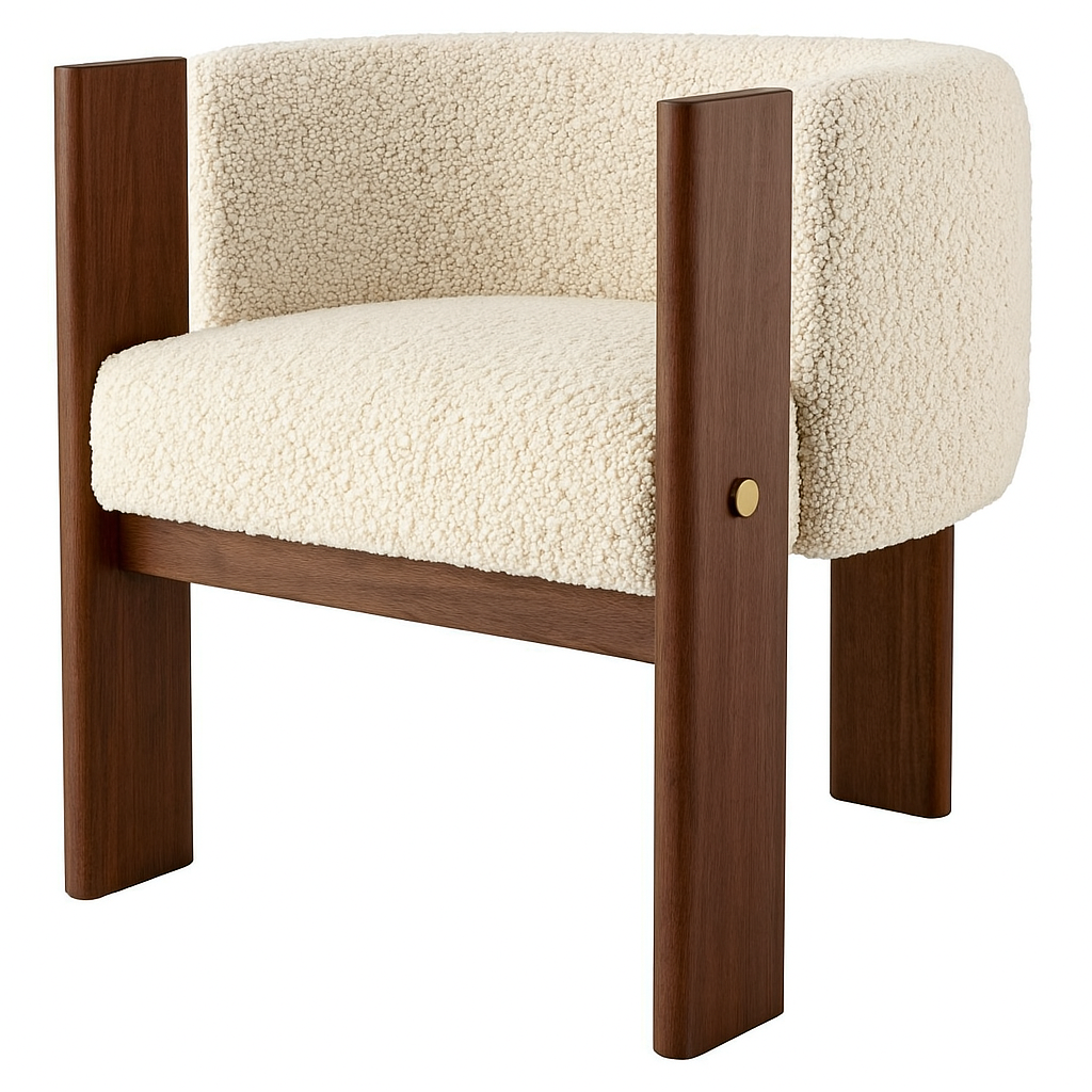 Ivory boucle-upholstered dining chair with a curved low back and thick cushioned seat, supported by solid walnut legs and arm posts with a small brass accent.