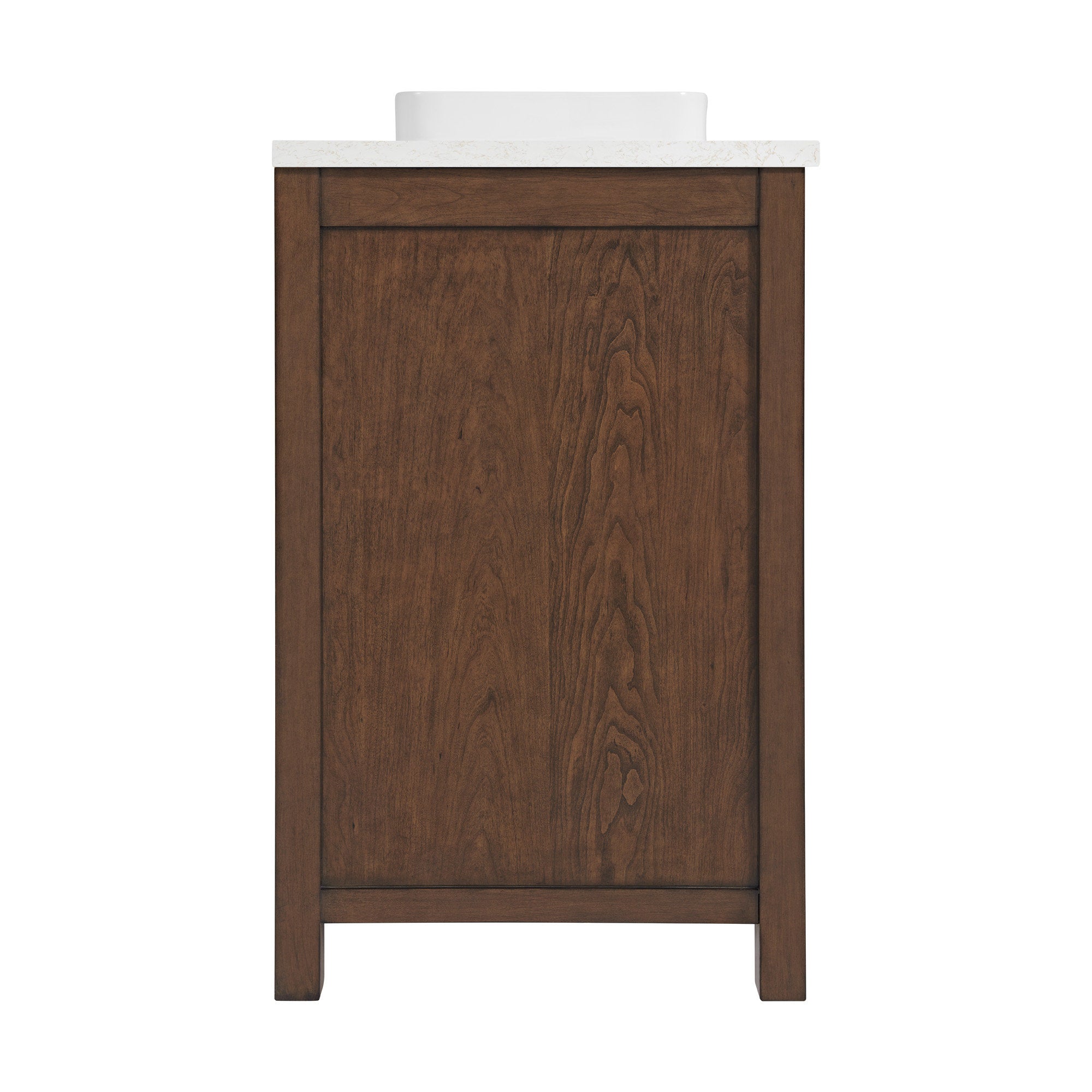 Side view of a solid wood freestanding bathroom vanity in warm brown with a stone top and a white ceramic vessel sink visible above the countertop.