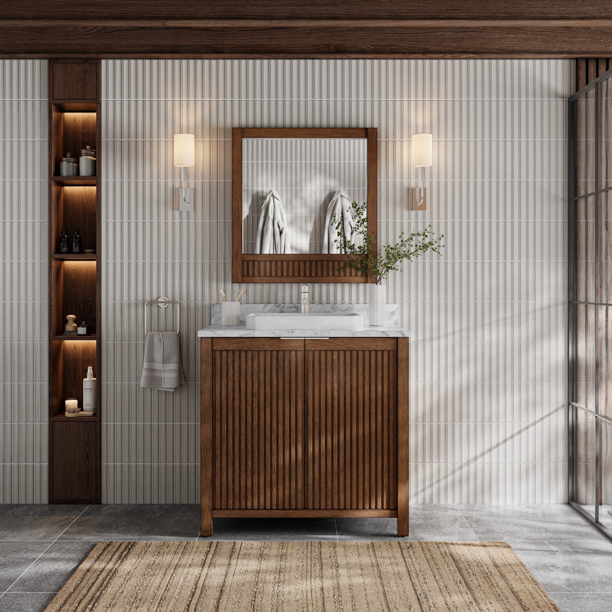 Modern freestanding bathroom vanity in natural solid wood with fluted cabinet doors and stone countertop, featuring a rectangular ceramic sink, wood-framed mirror, wall sconces and illuminated recessed shelving.