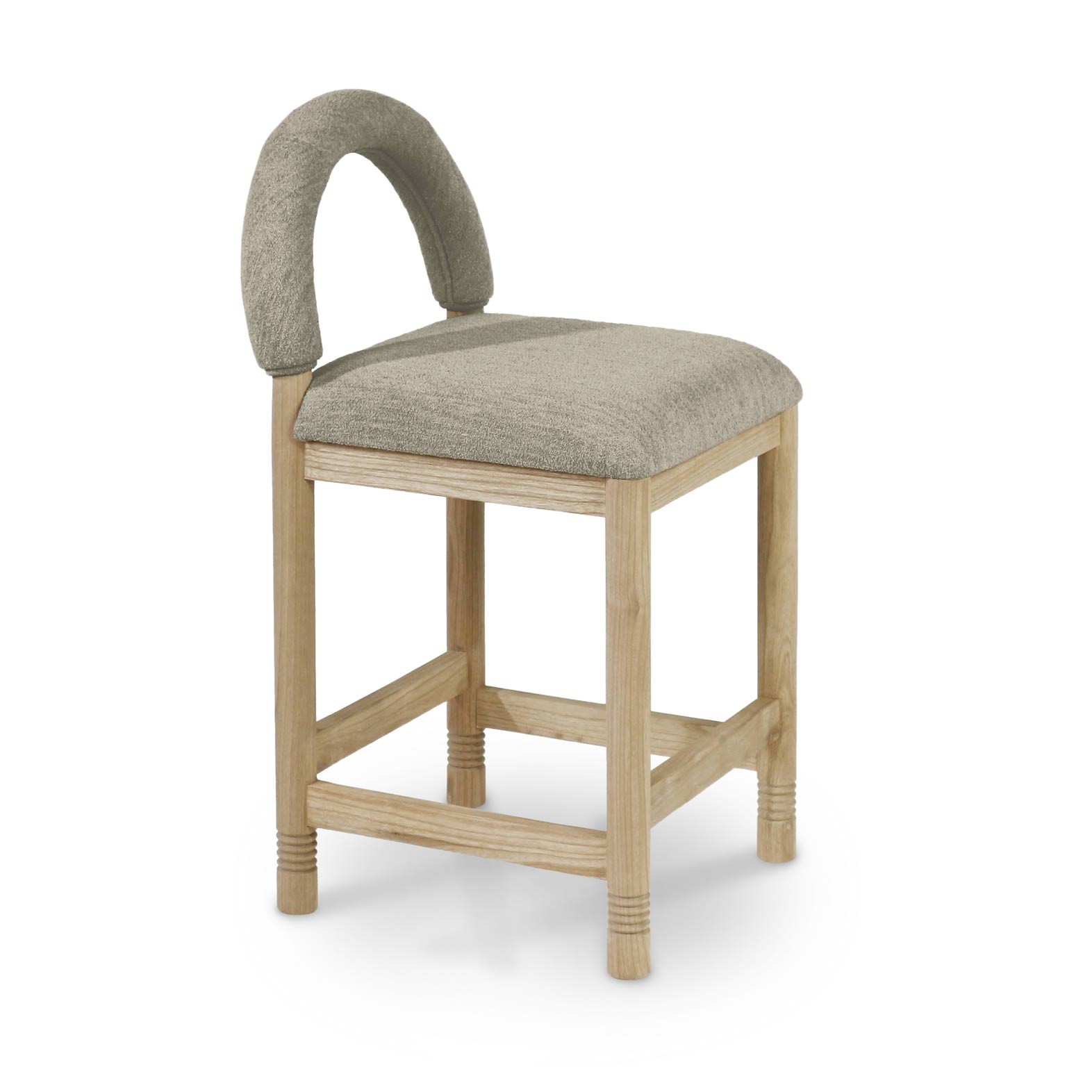 Taupe boucle upholstered counter stool with a low arched back and padded seat, supported by a natural oak square frame with stretcher footrest and subtle turned leg rings, shown on a white background.