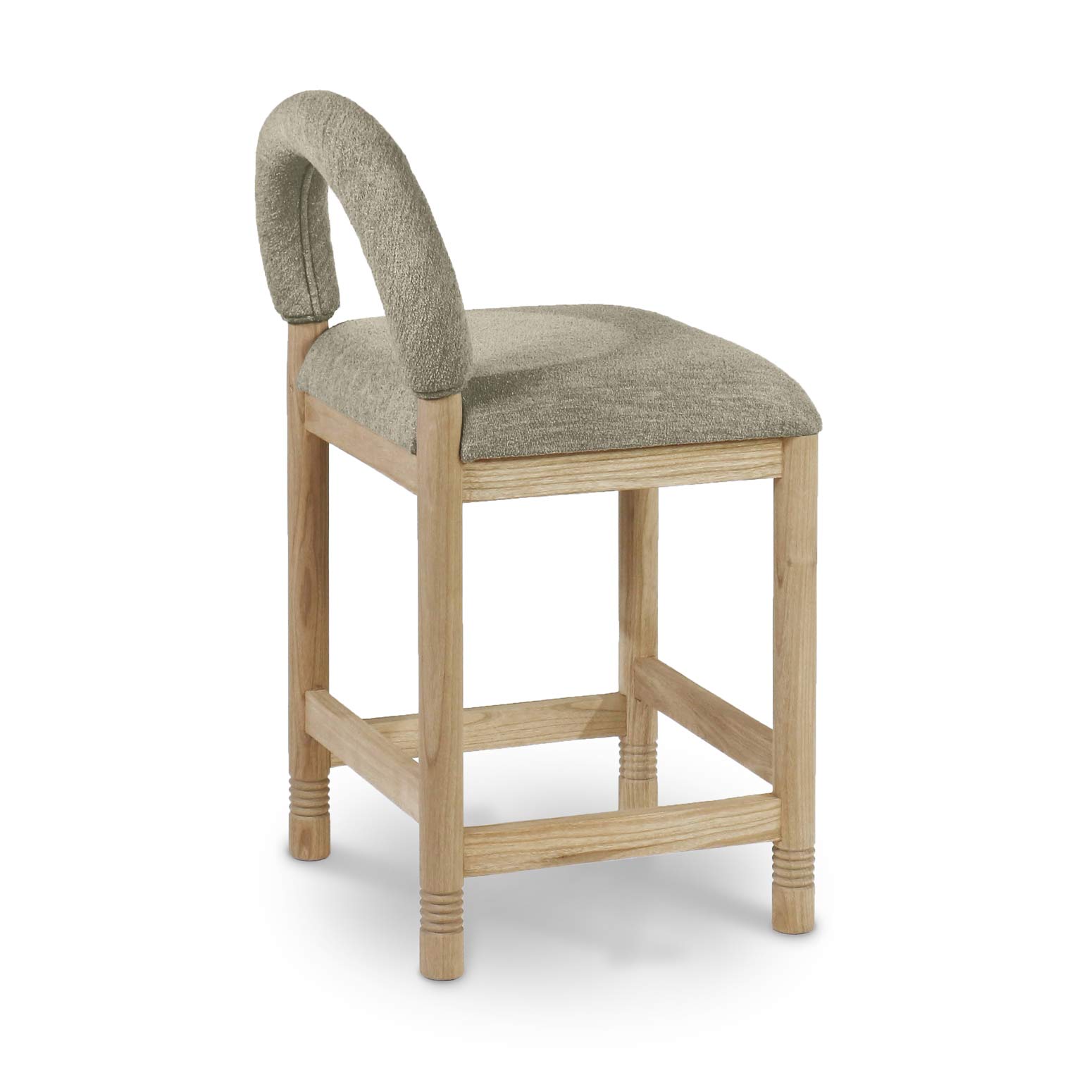 Side view of a counter stool with a natural oak frame and taupe boucle upholstered seat and arched back, square legs with stretcher footrests and subtle turned ring details at the leg ends.