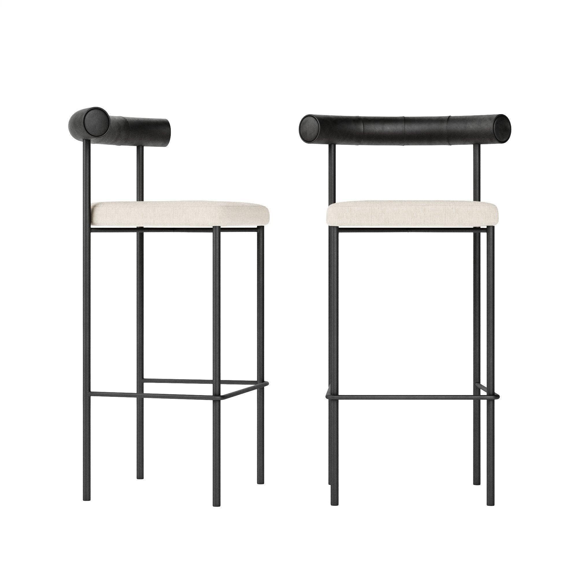 Two modern bar stools with matte black steel frames, cylindrical black faux leather low backrests and light beige upholstered seats, shown side and front on a white background.