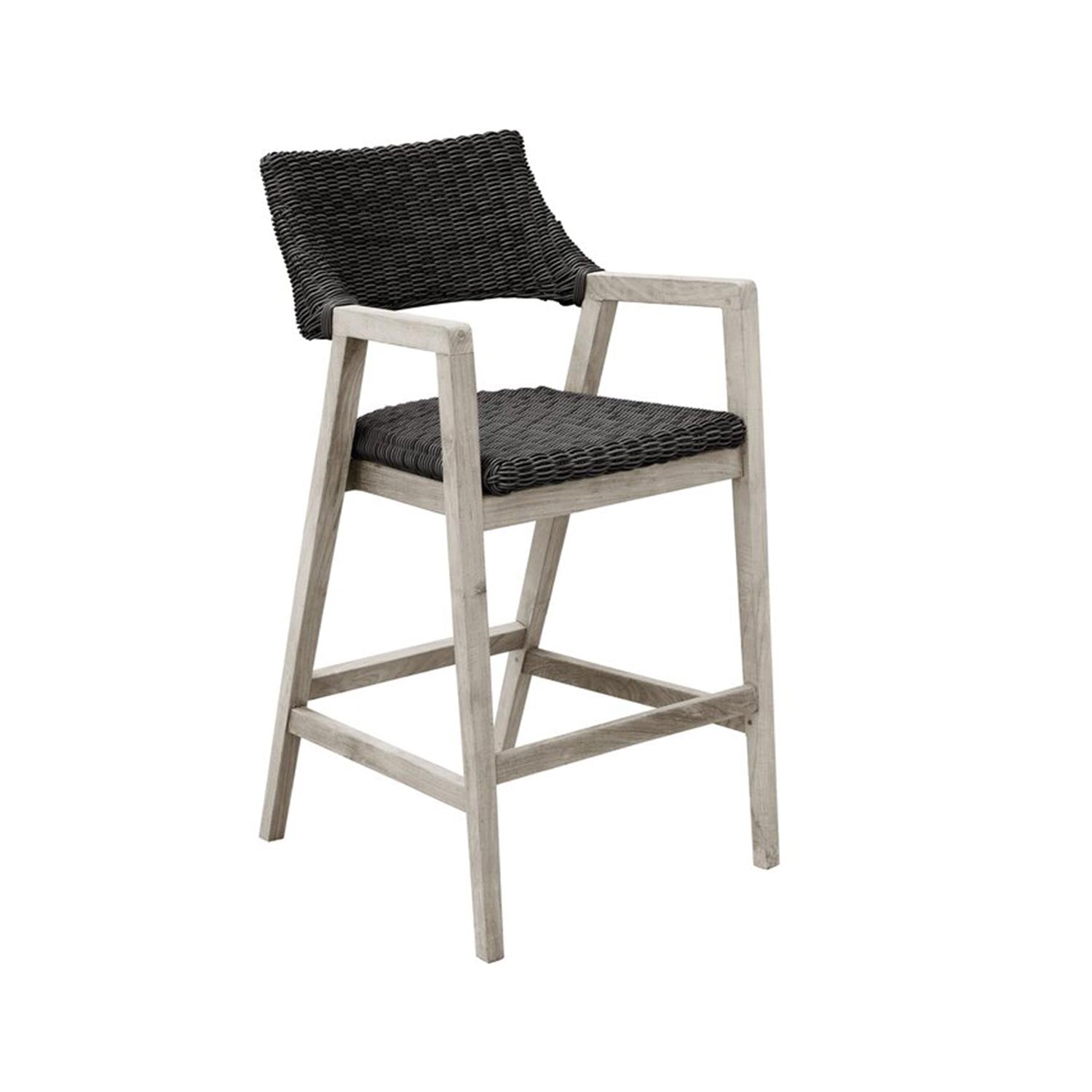 Coastal outdoor bar stool with a natural teak wood frame and dark gray woven rope seat and back, angled legs and integrated armrests shown on a white background.