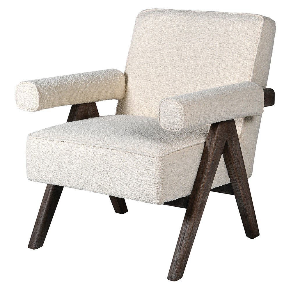 Cream boucle-upholstered accent chair with cylindrical padded arms, wide cushioned seat and full back, resting on angled dark natural wood A-frame legs in a mid-century modern silhouette.