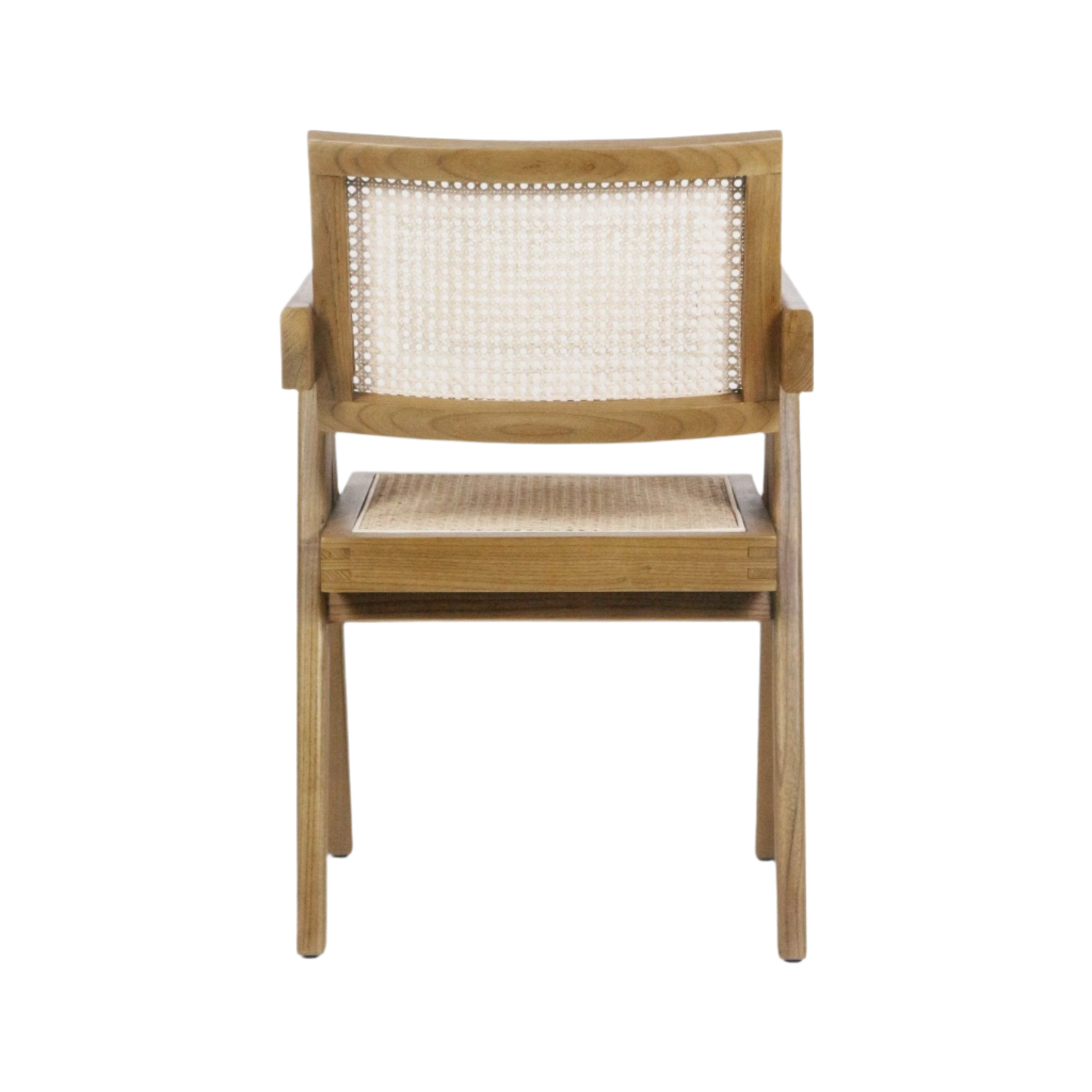 Rear view of a natural teak dining chair with woven cane back and cane seat, solid wood frame and short arms in a mid-century modern style on a white background.