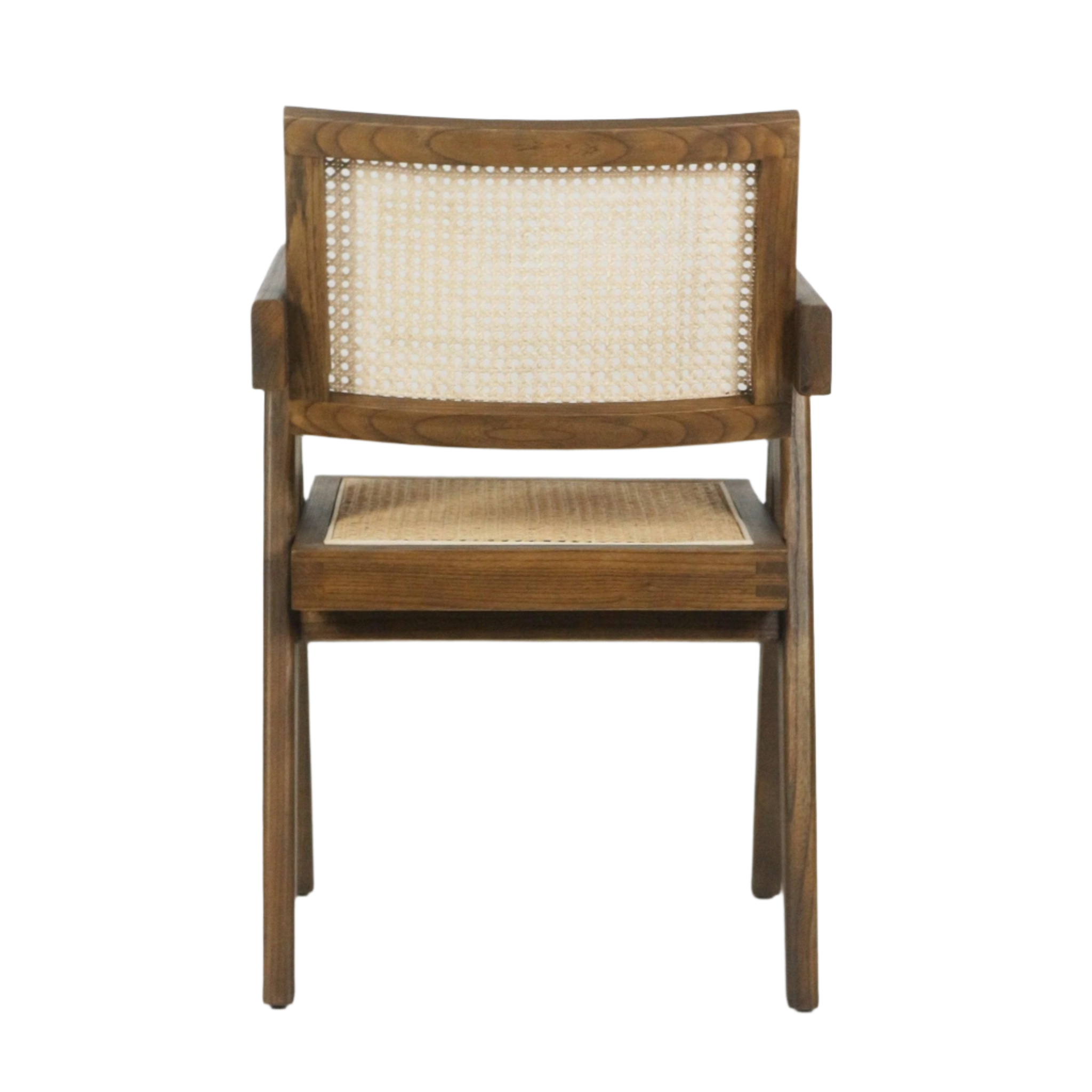 Rear view of a solid teak dining chair with woven cane back and cane seat, warm natural wood finish, short wooden arms and slim tapered legs.