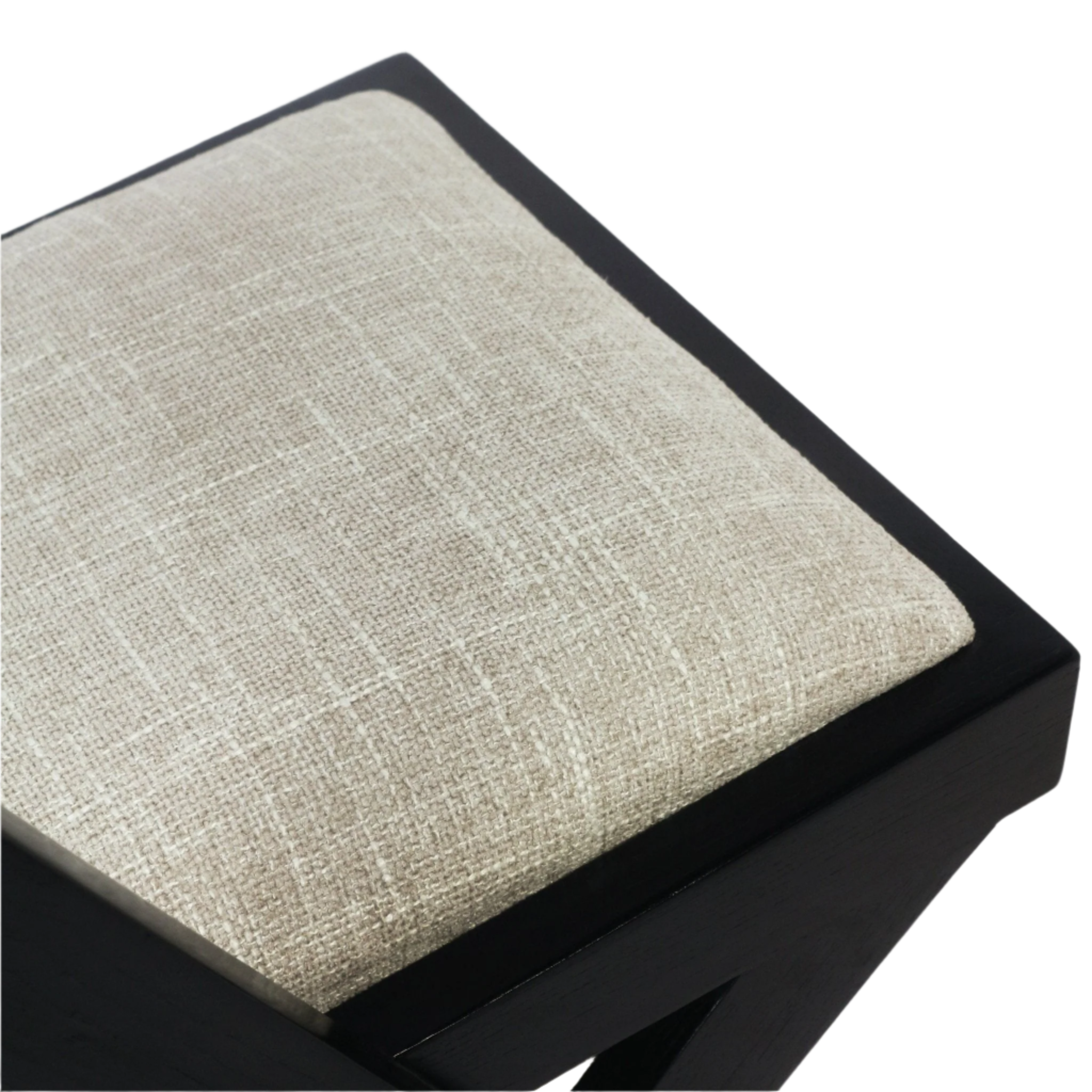 Close-up of a beige woven upholstery seat cushion resting on a black semi-gloss wood chair frame, highlighting the textured fabric weave and cushioned edge.