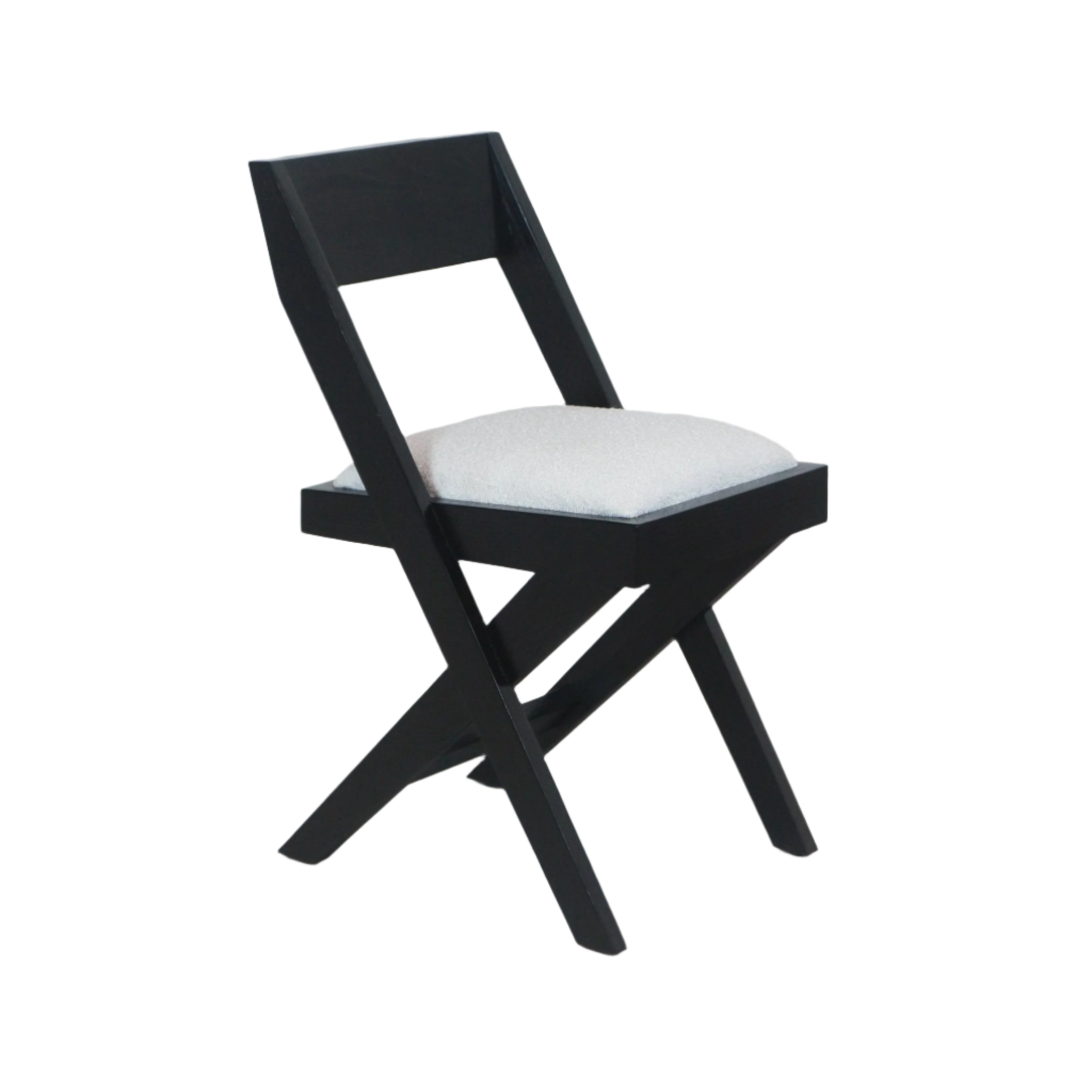 Mid-century modern black wood side chair with an angular X-shaped frame and a white boucle upholstered seat cushion.