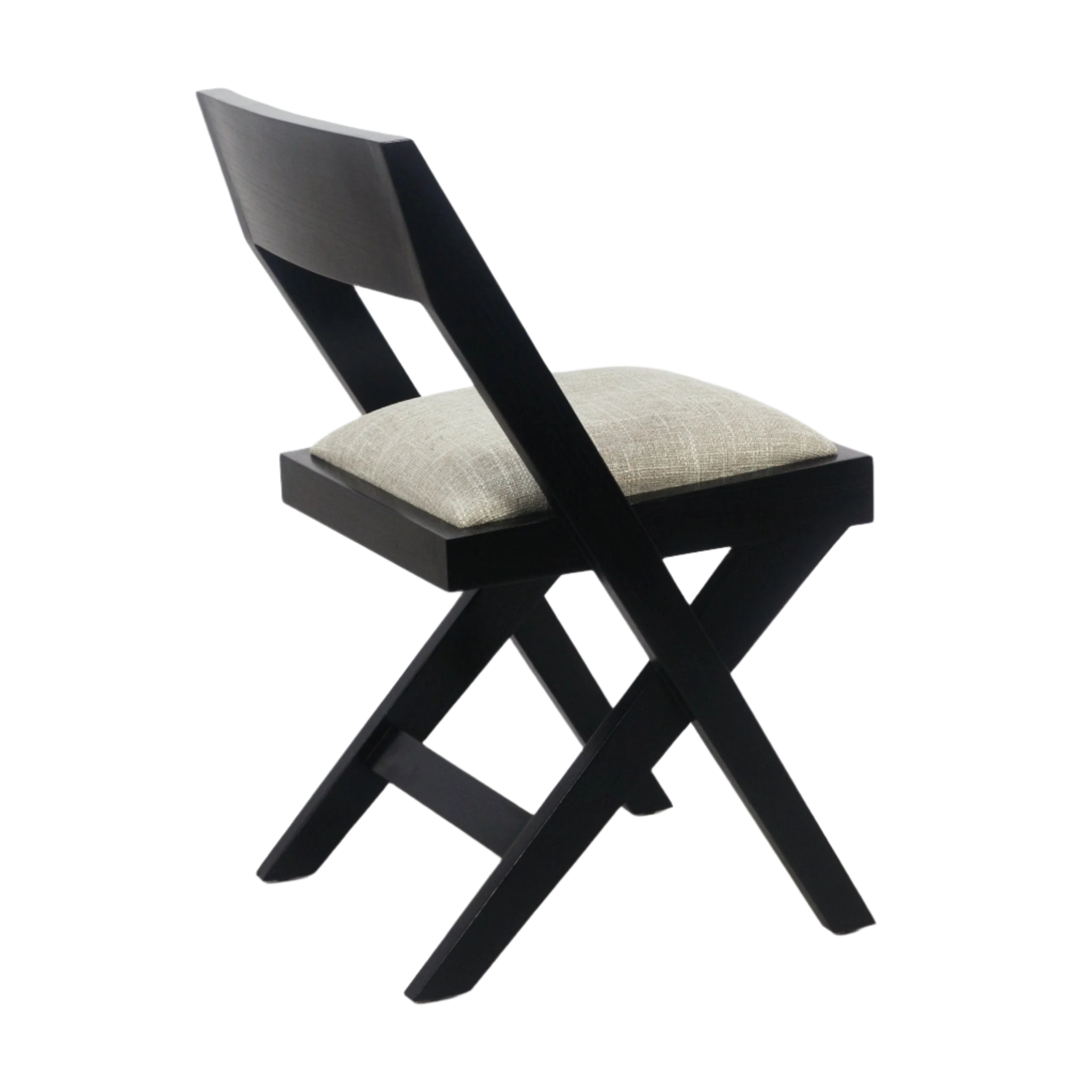 Side view of a mid-century modern side chair with a black wooden X-frame, angled backrest and an armless beige textured upholstered seat cushion.