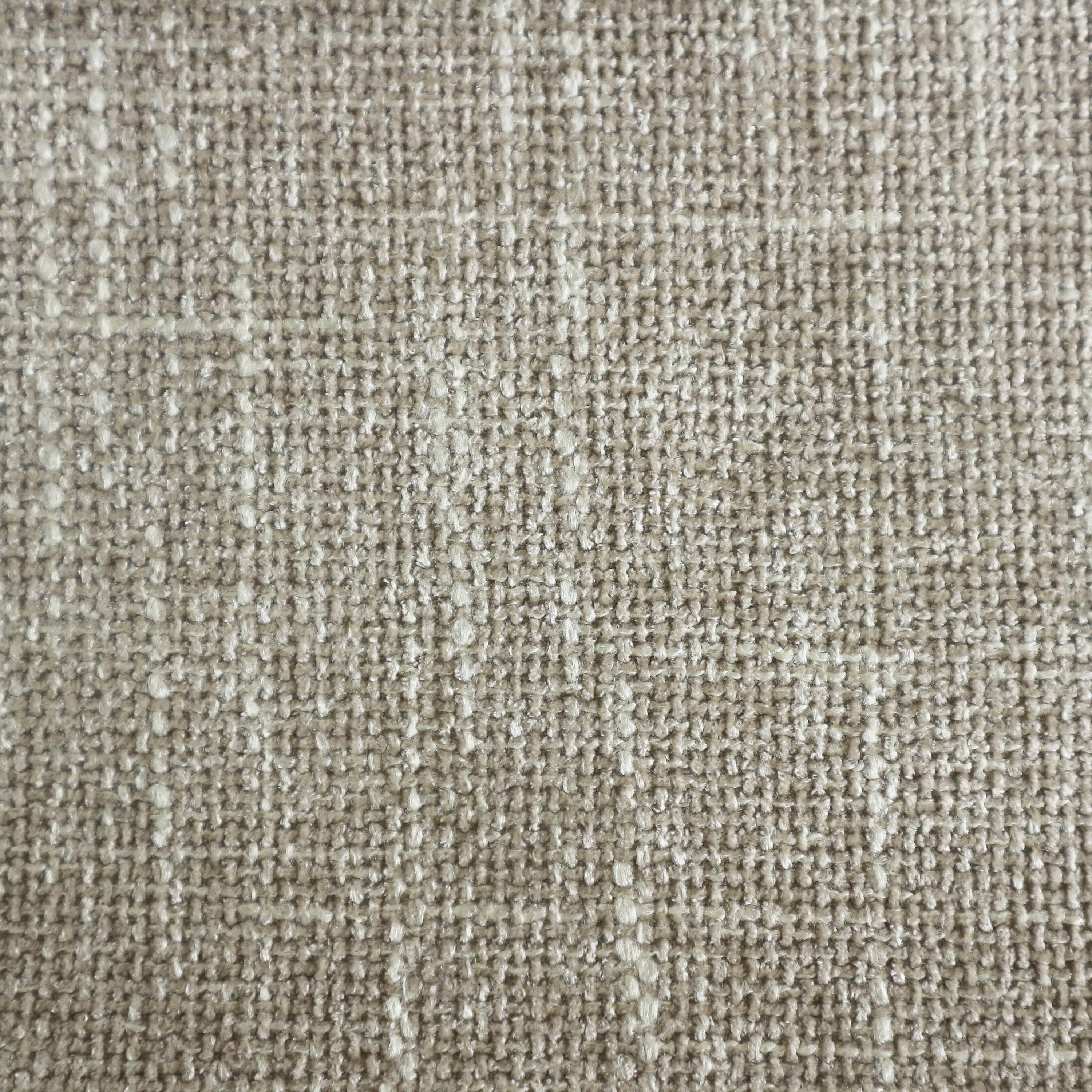 Close-up of beige chenille upholstery showing tight woven texture and subtle looped yarns, highlighting fabric detail for a cushioned dining side chair.