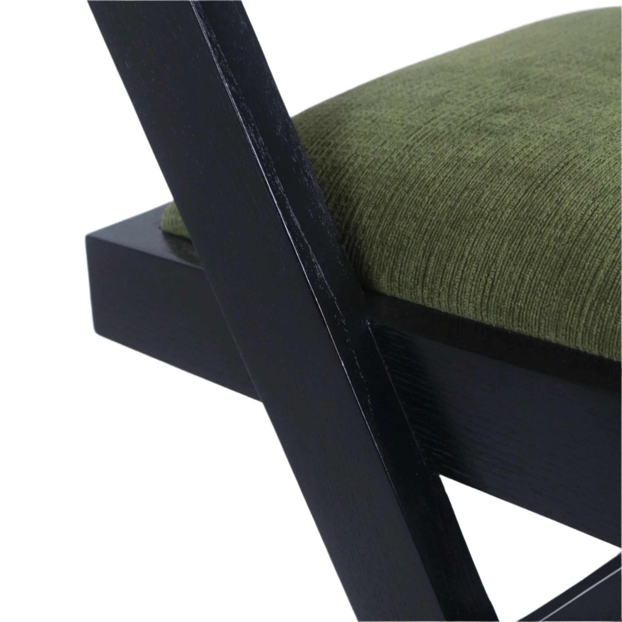 Close-up of a black wood chair frame and angled leg with an olive green chenille upholstered seat cushion, showing textured fabric and visible wood grain.