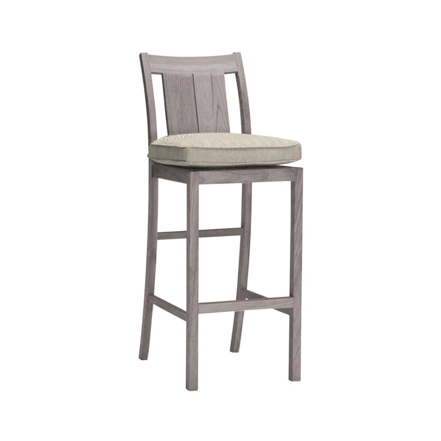 Armless teak outdoor bar stool with a slatted back, square legs and footrest, topped with a beige textured seat cushion in a natural teak finish for coastal-style counter seating.