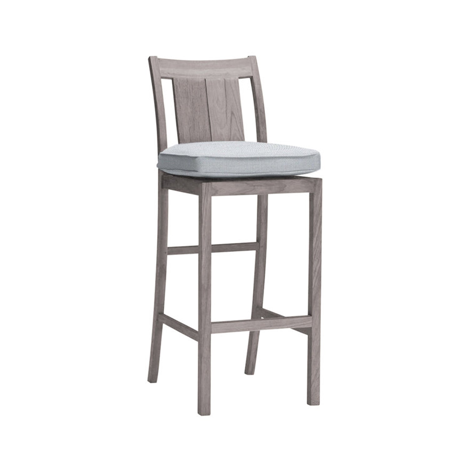 Armless teak outdoor bar stool in a natural teak finish with a light-gray seat cushion, slatted back, square legs and built-in footrest.