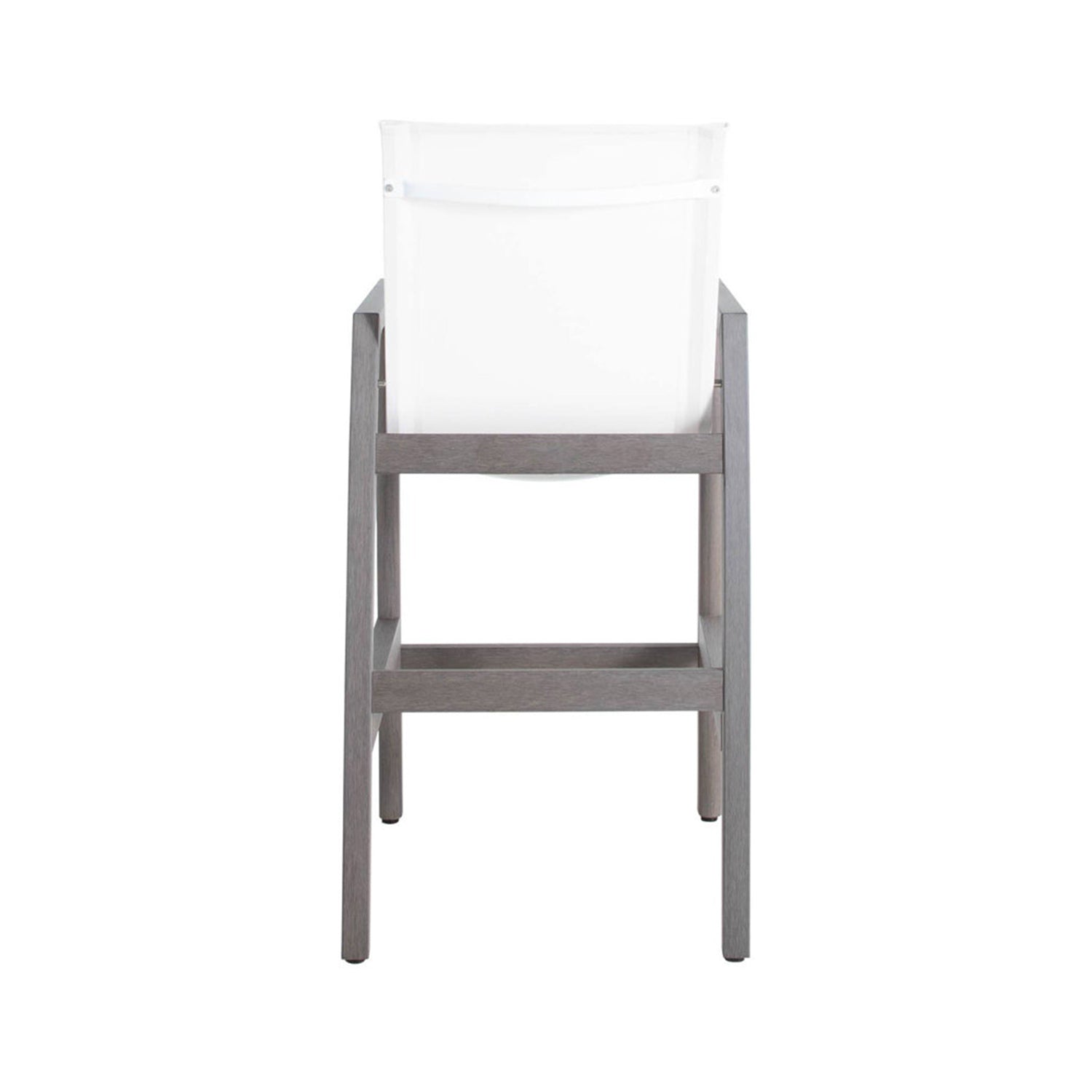 Rear view of a coastal teak outdoor bar stool with a white sling back, teak wood frame, straight legs and a built-in horizontal footrest.