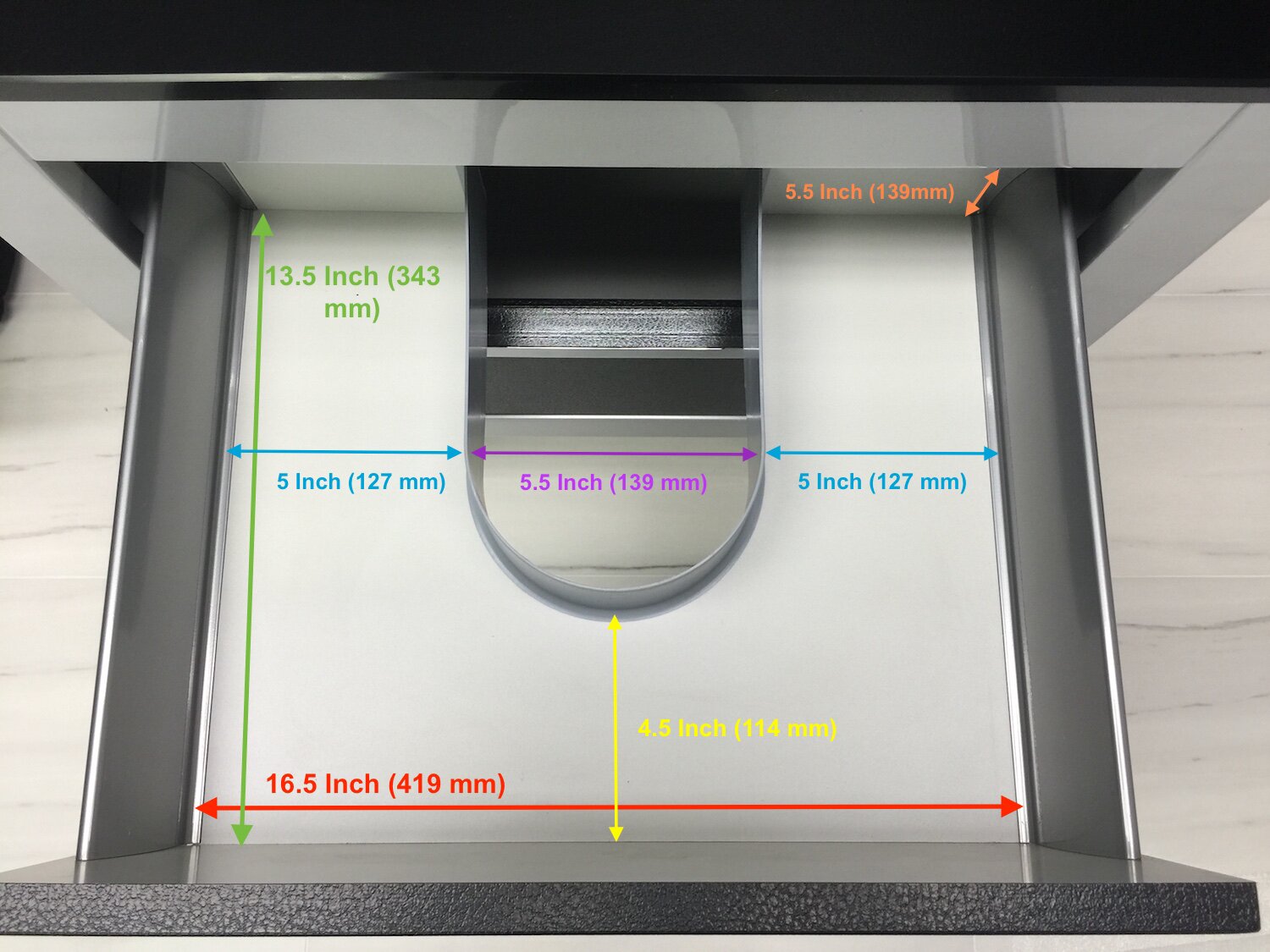 Top-down view of a modern stone-top, solid wood single-sink bathroom vanity interior showing a semicircular plumbing cutout, inner shelf rails and colorful measurement overlays indicating widths and depths.
