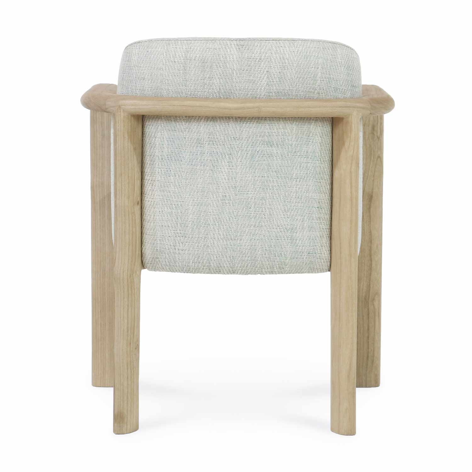 Rear view of a modern dining chair with light neutral woven upholstery and a natural oak wood frame, highlighting the curved wraparound arm and straight round legs.
