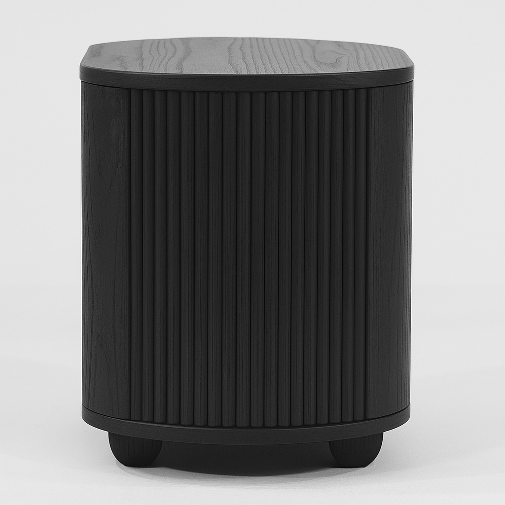 Front view of a modern black solid wood nightstand with a curved fluted tambour front, smooth rounded top and low rounded bun feet, Scandinavian-inspired minimalist design.