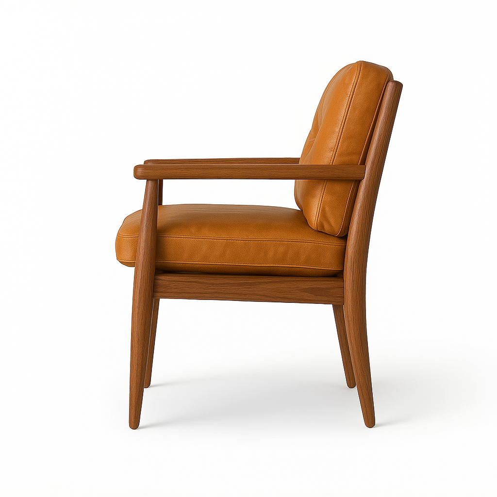 Side profile of a dining chair upholstered in tan aged nubuck leather with a walnut wood frame, tapered mid-century legs and wooden armrests, showing a cushioned seat and back.